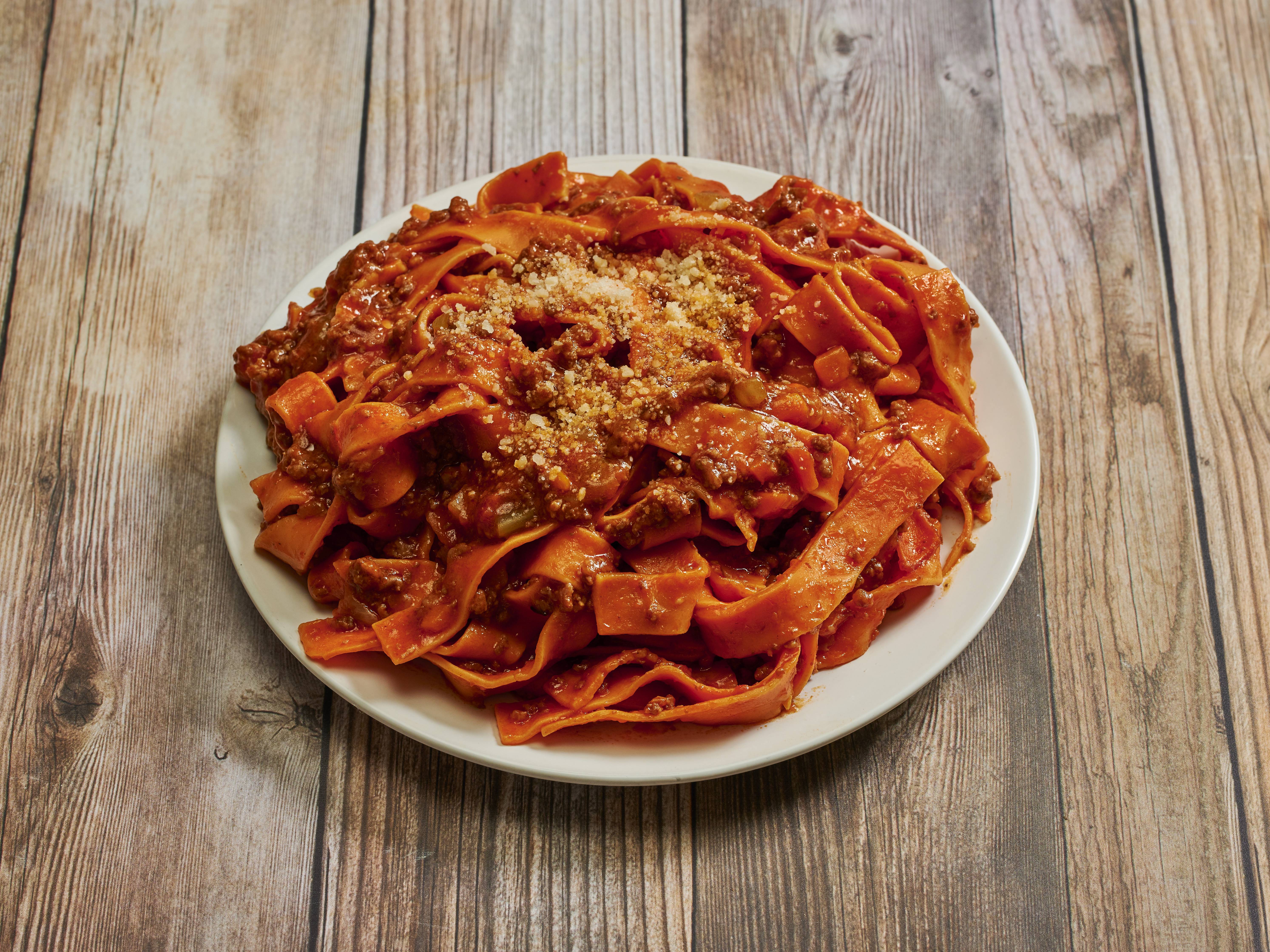 Order Pappardelle Bolognese food online from Cucina Alessa store, Huntington Beach on bringmethat.com