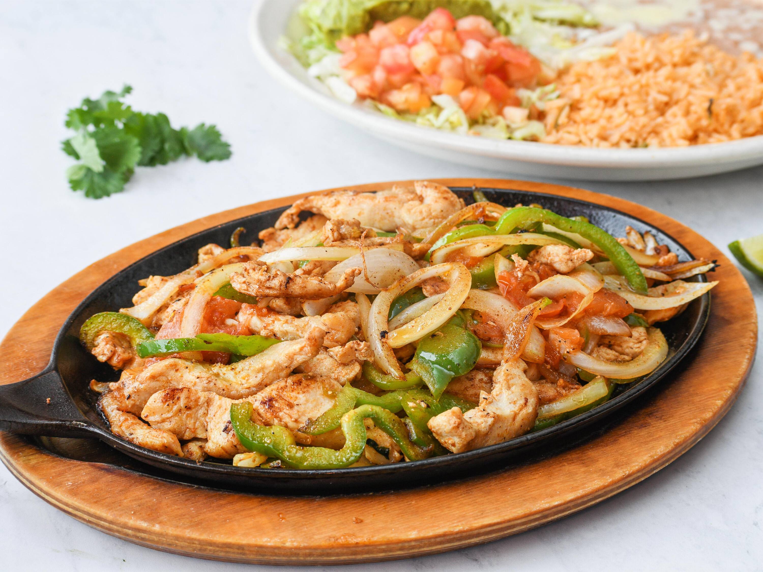 Order Chicken Fajitas food online from Tres Amigos Mexican Rest store, Ringgold on bringmethat.com
