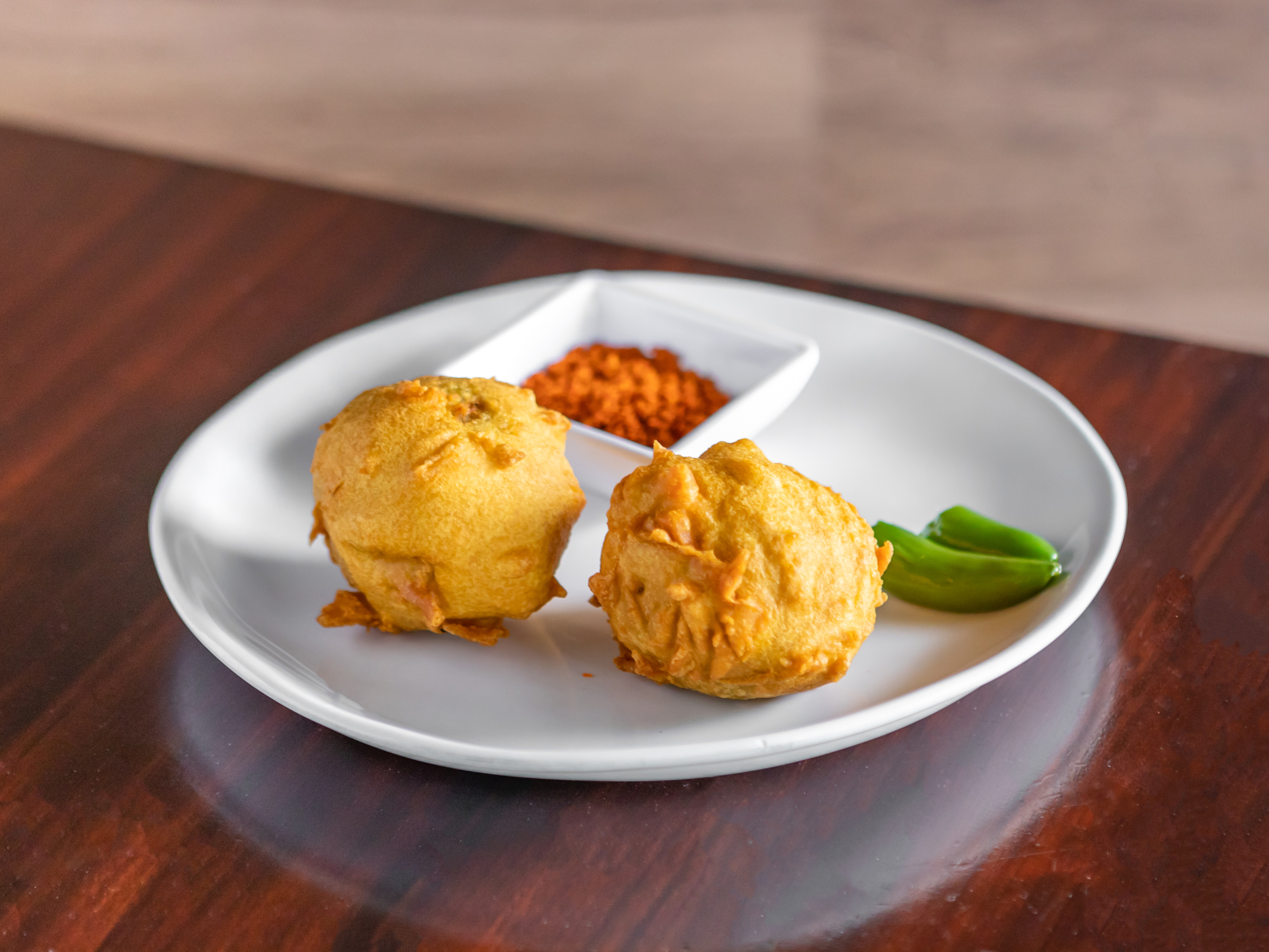 Order Batata Vada Plate (2 pieces) food online from Annapoorna Restaurant store, Milpitas on bringmethat.com