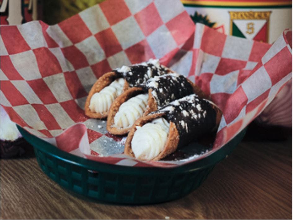 Order Chocolate Chip Cannoli - 1 Piece food online from Italian Village Pizza store, Canonsburg on bringmethat.com