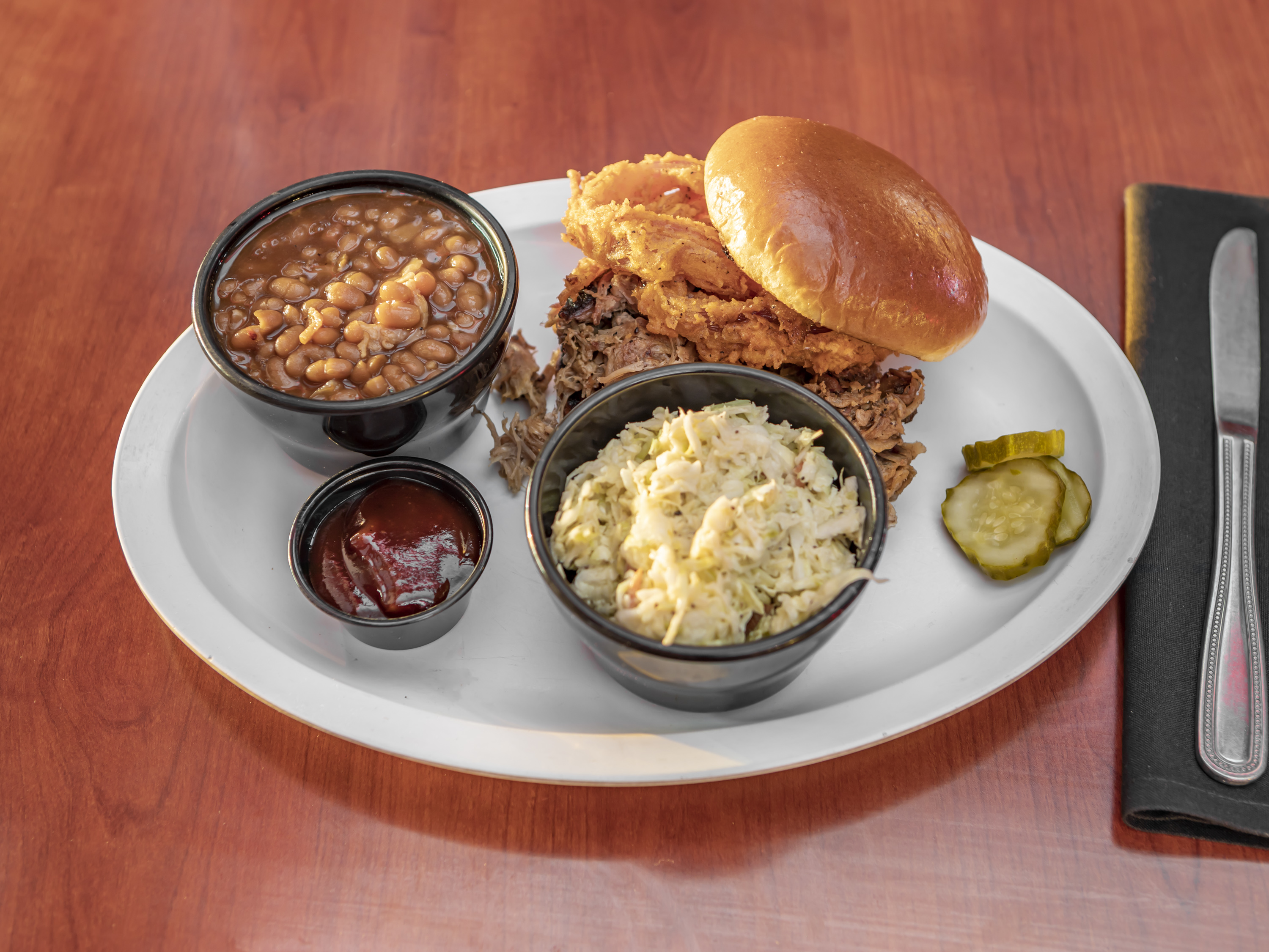 Order Pulled Pork Sandwich food online from Firehouse Bar & Grill store, St. Louis on bringmethat.com