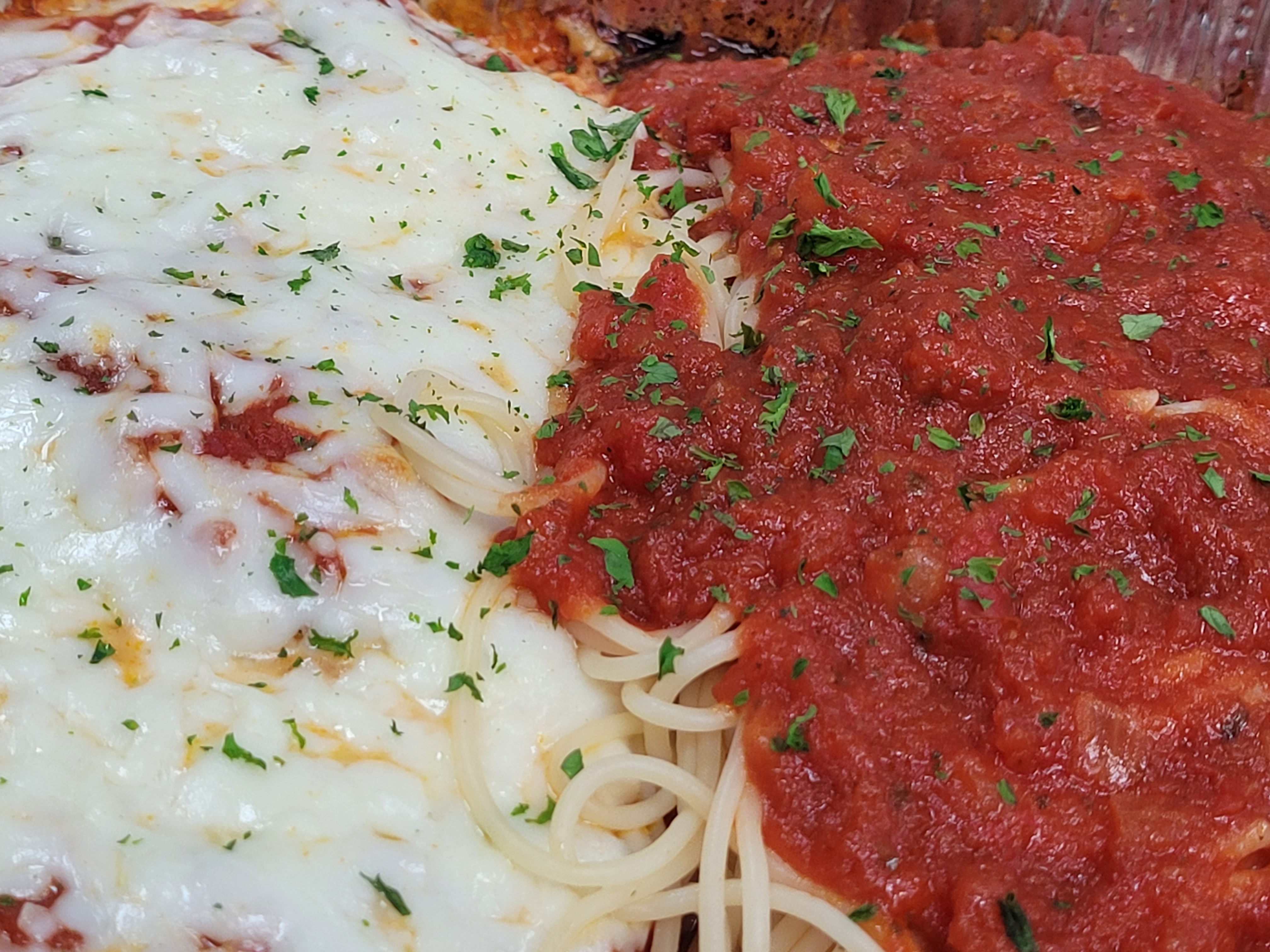Order Chicken Parmigiana food online from Illianos Pizza store, Clemmons on bringmethat.com