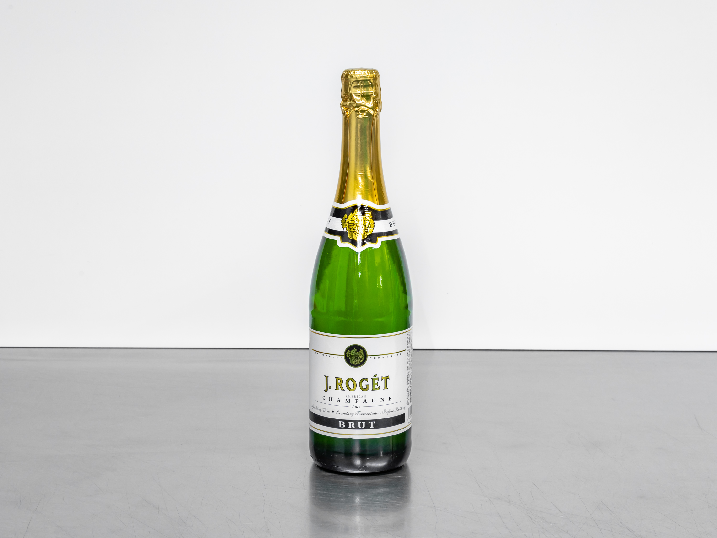 Order J. Roget Brut Champagne 750 ml. food online from In The Zone Vi store, Apache Junction on bringmethat.com