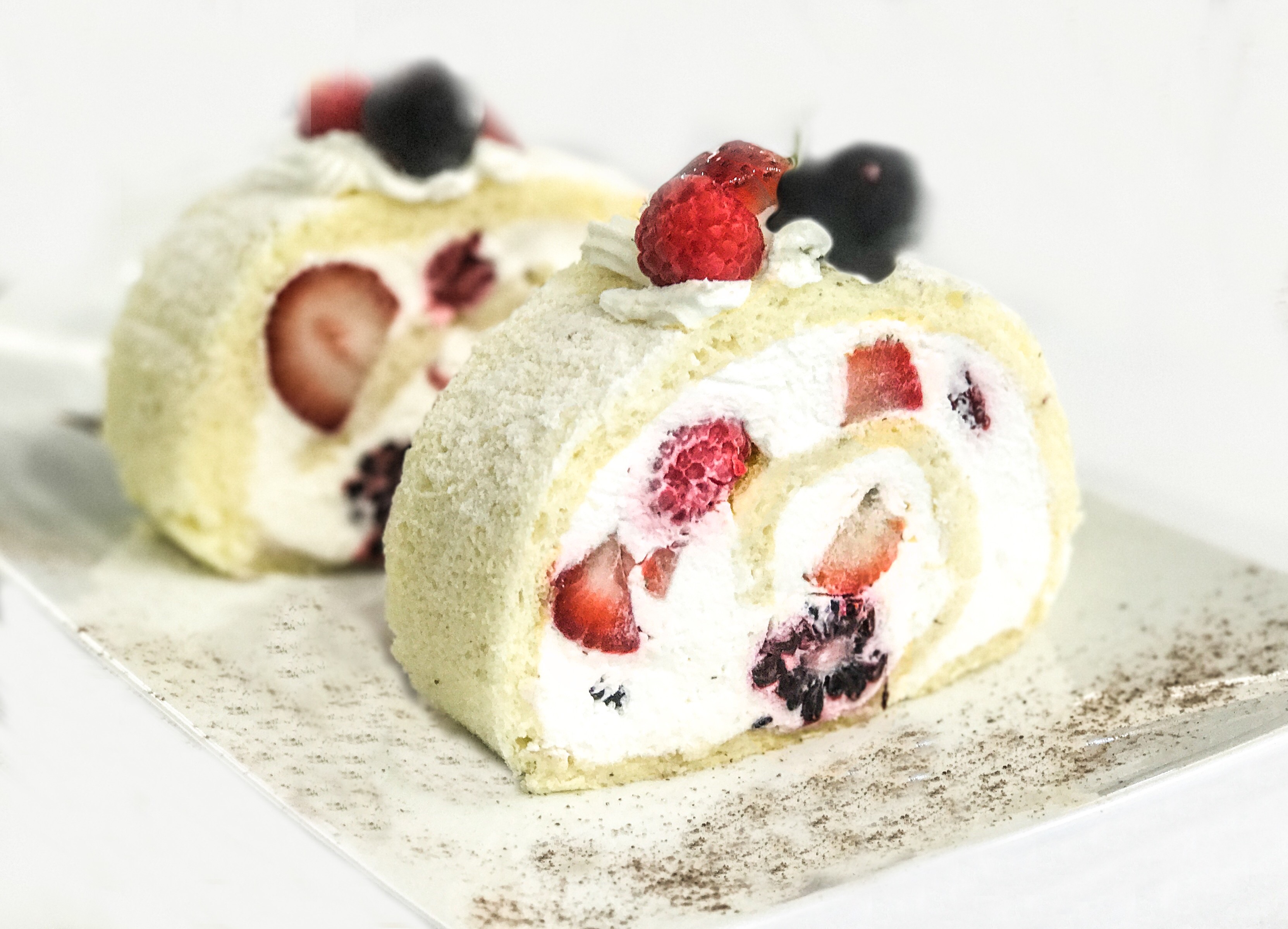 Order Large mixed berry rolada food online from Pastries By Edie store, Canoga Park on bringmethat.com