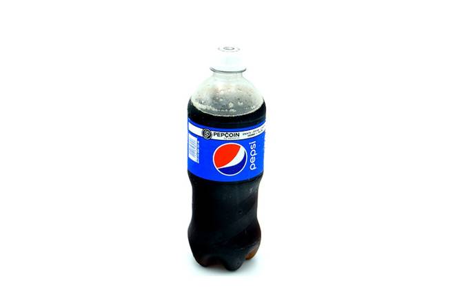 Order Pepsi (20oz) food online from Royal Farms store, Dover on bringmethat.com