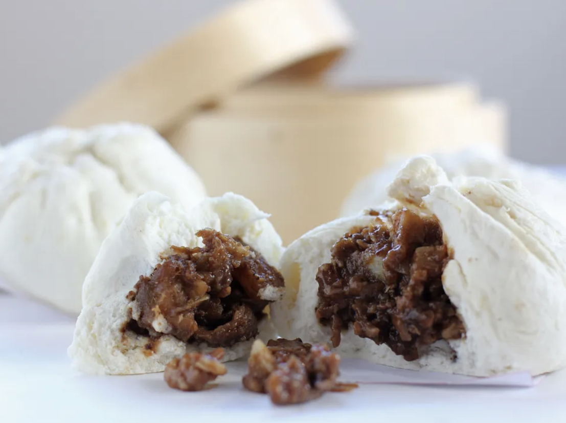 Order Xa Xiu Banh Bao (steamed BBQ Pork bun) food online from Pho And Cafe Anh Hong store, Upper Darby on bringmethat.com