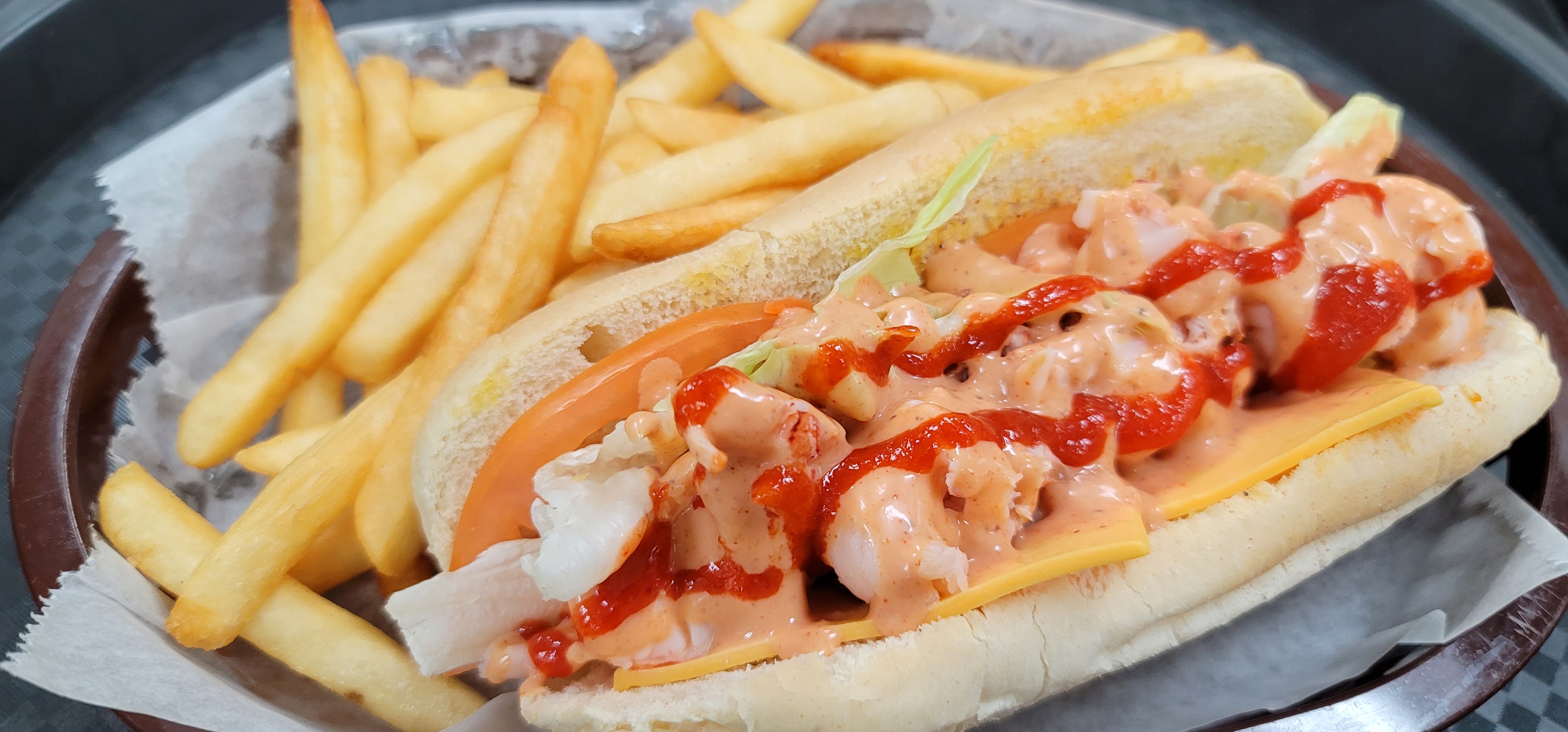 Order R5. Lobster Roll Sandwich food online from La Juicy Seafood store, O'Fallon on bringmethat.com