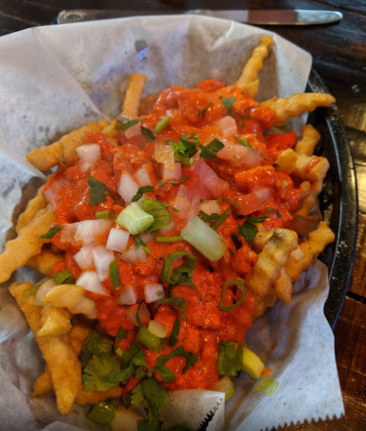 Order Loaded Fries food online from The Momo World store, Chicago on bringmethat.com