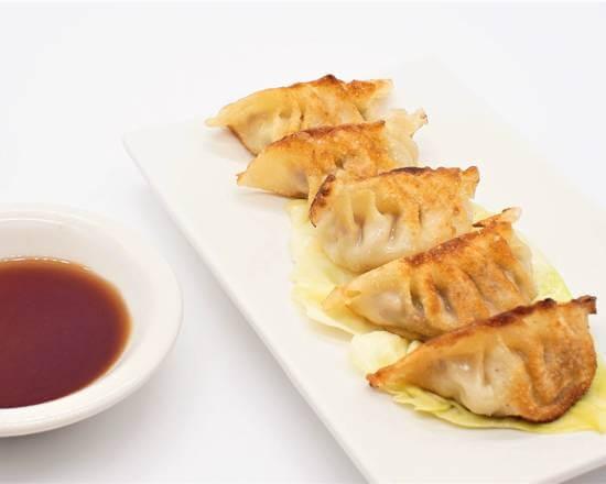 Order Pan-Fried Potstickers(5) food online from Kim Son Cafe  store, Houston on bringmethat.com