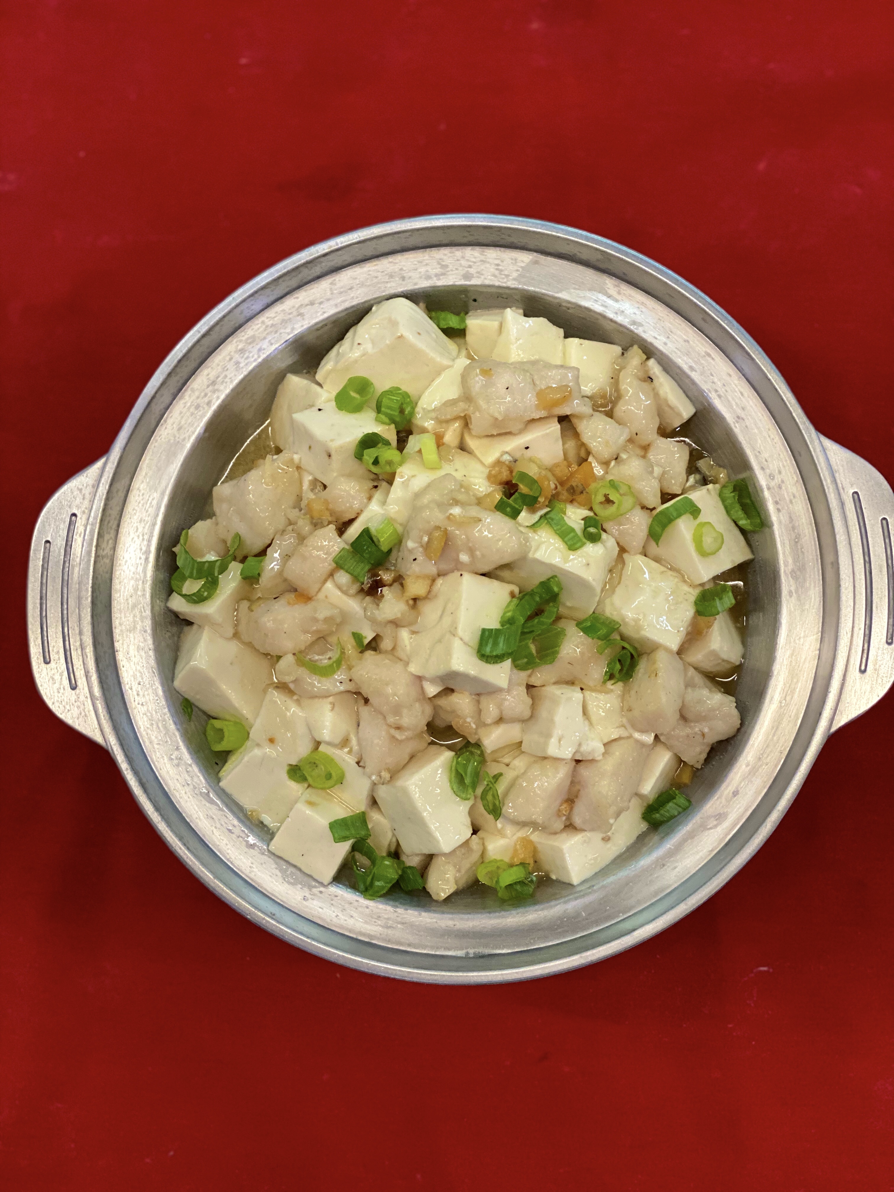 Order 80. BEAN CURD and DICED CHICKEN With SALTED FISH IN CLAY POT food online from Great Eastern Restaurant store, San Francisco on bringmethat.com