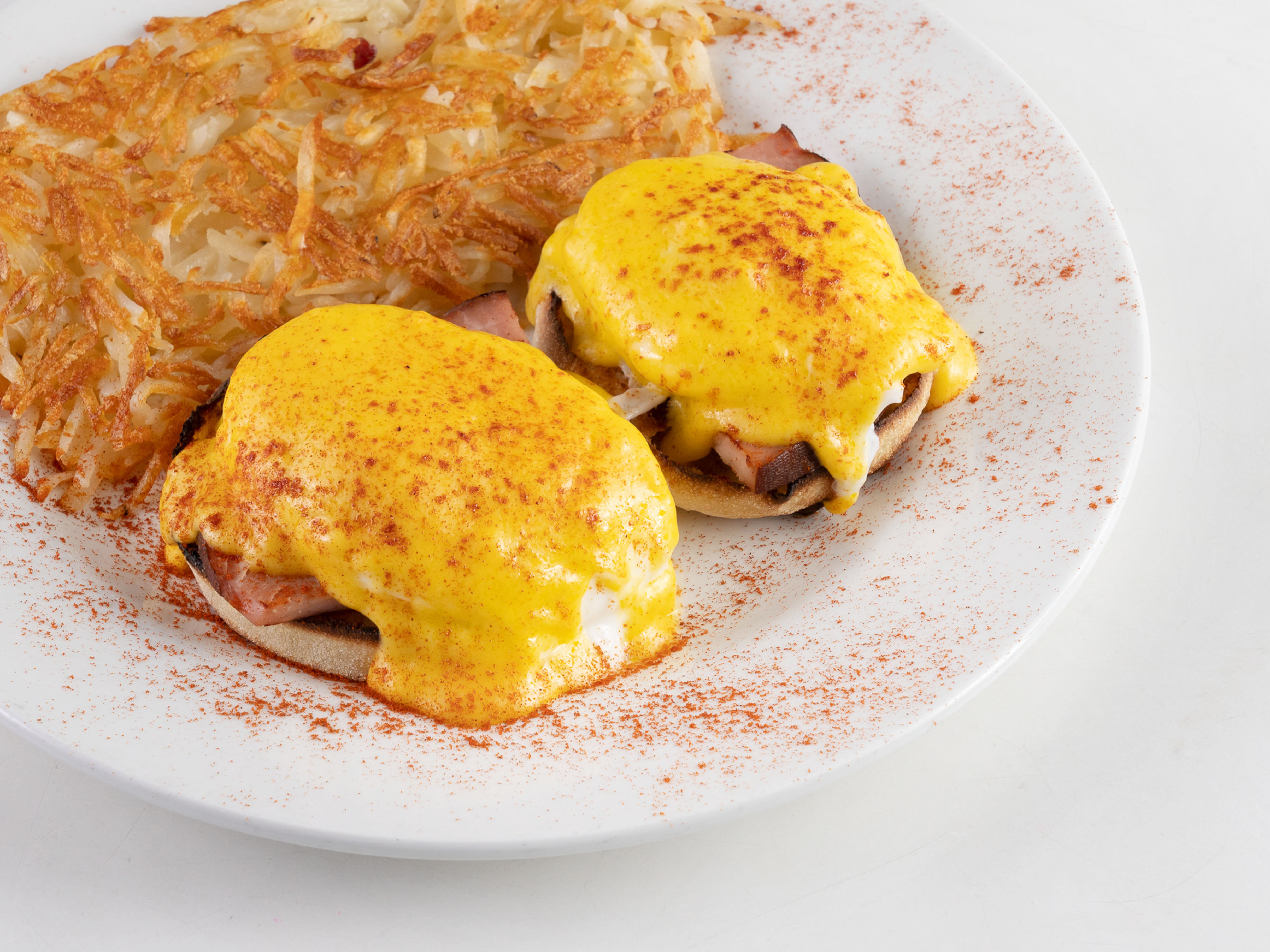 Order Eggs Benedict food online from Victor's Deli and Restaurant store, Houston on bringmethat.com