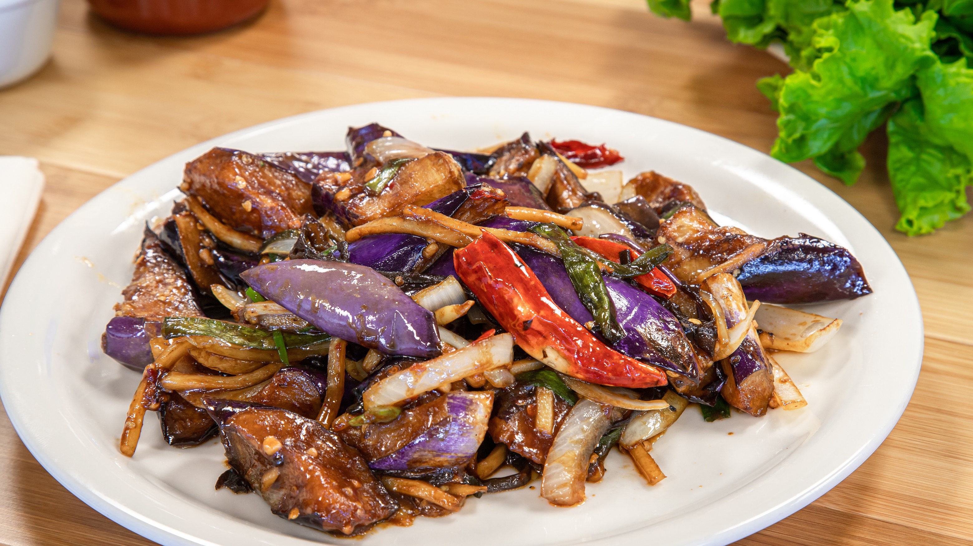 Order 13. Eggplant with Garlic & Szechuan Sauce food online from Pho Cafe Hong Kong Diner store, Reno on bringmethat.com