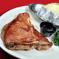 Order 7. 1 lb T-Bone food online from Mackie Steakhouse store, Oklahoma City on bringmethat.com