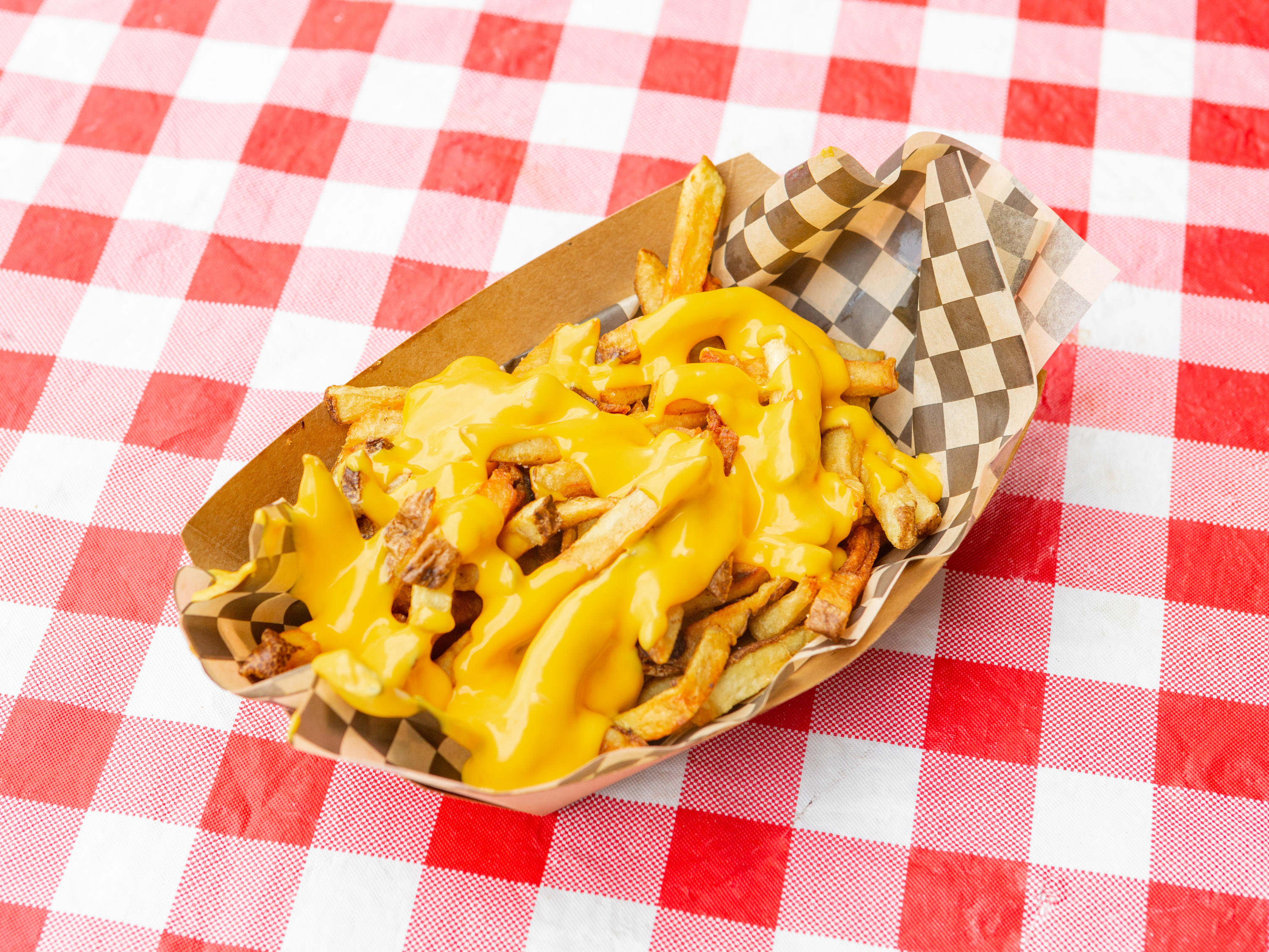 Order Cheesy Fries food online from The Smokehouse Bbq & Catering store, Anchorage on bringmethat.com
