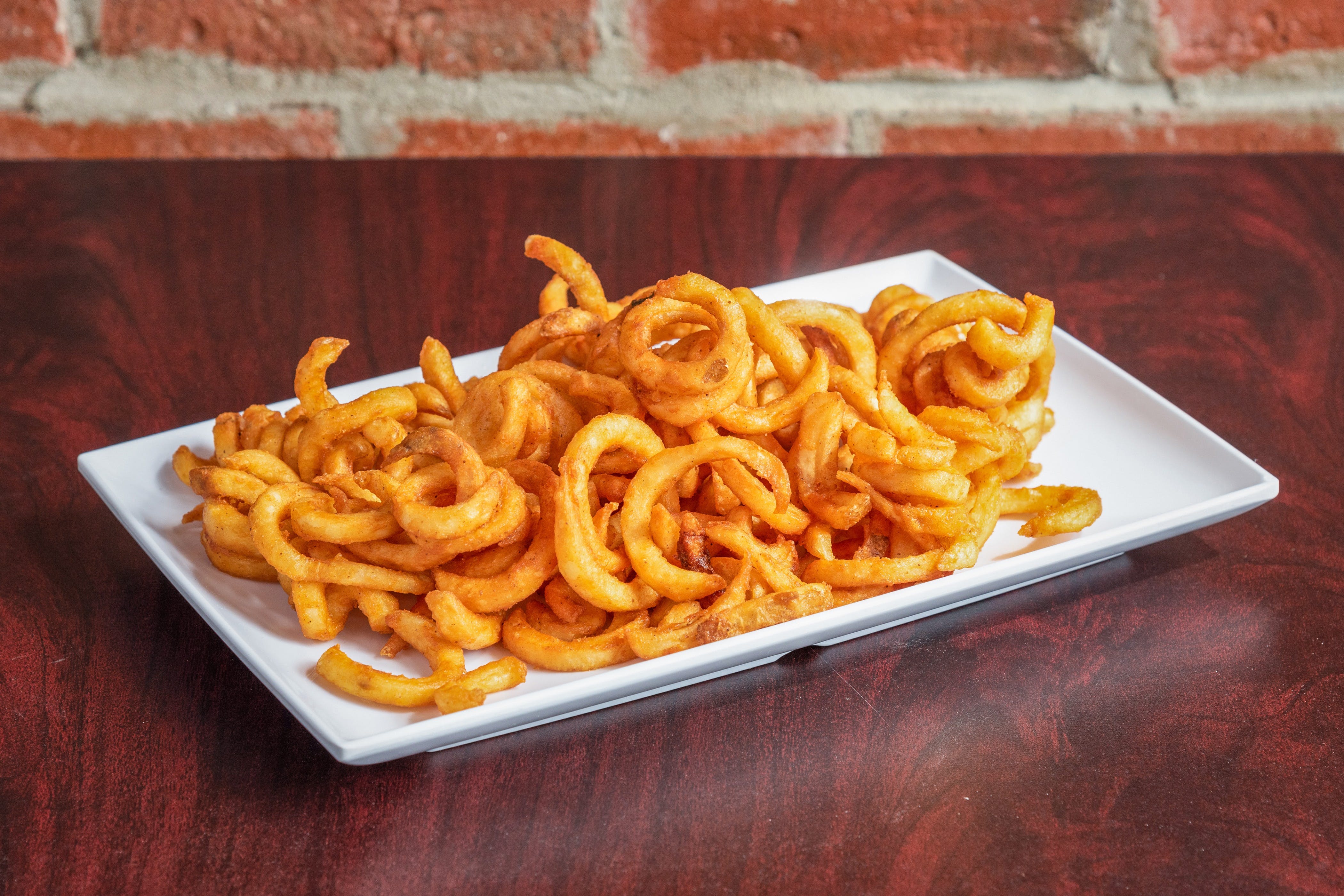 Order Curly Fries - Appetizer food online from Pizzeria 260 store, Boston on bringmethat.com