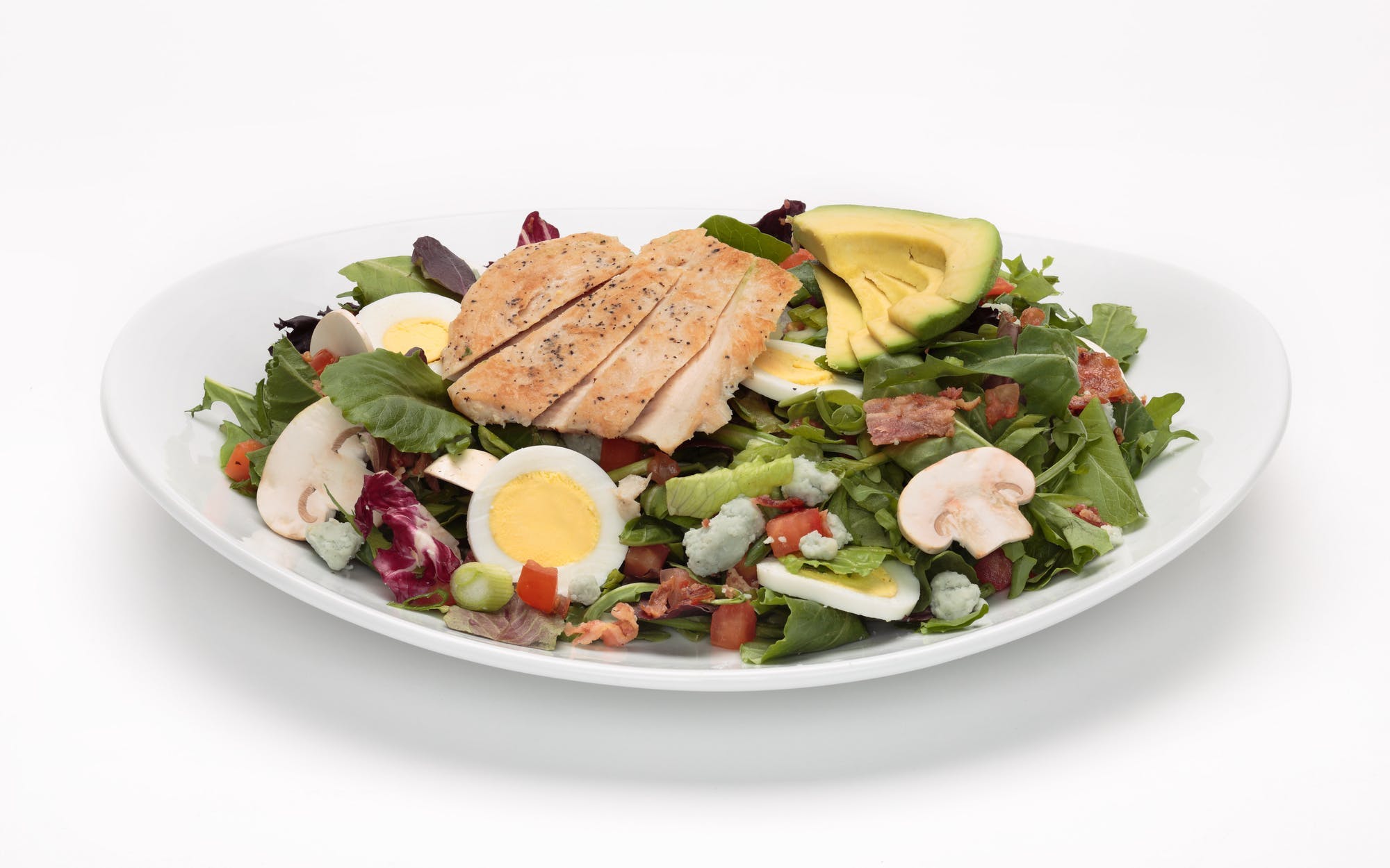 Order California Cobb Salad - Half Size food online from Oggi Sports | Brewhouse | Pizza store, Mission Viejo on bringmethat.com