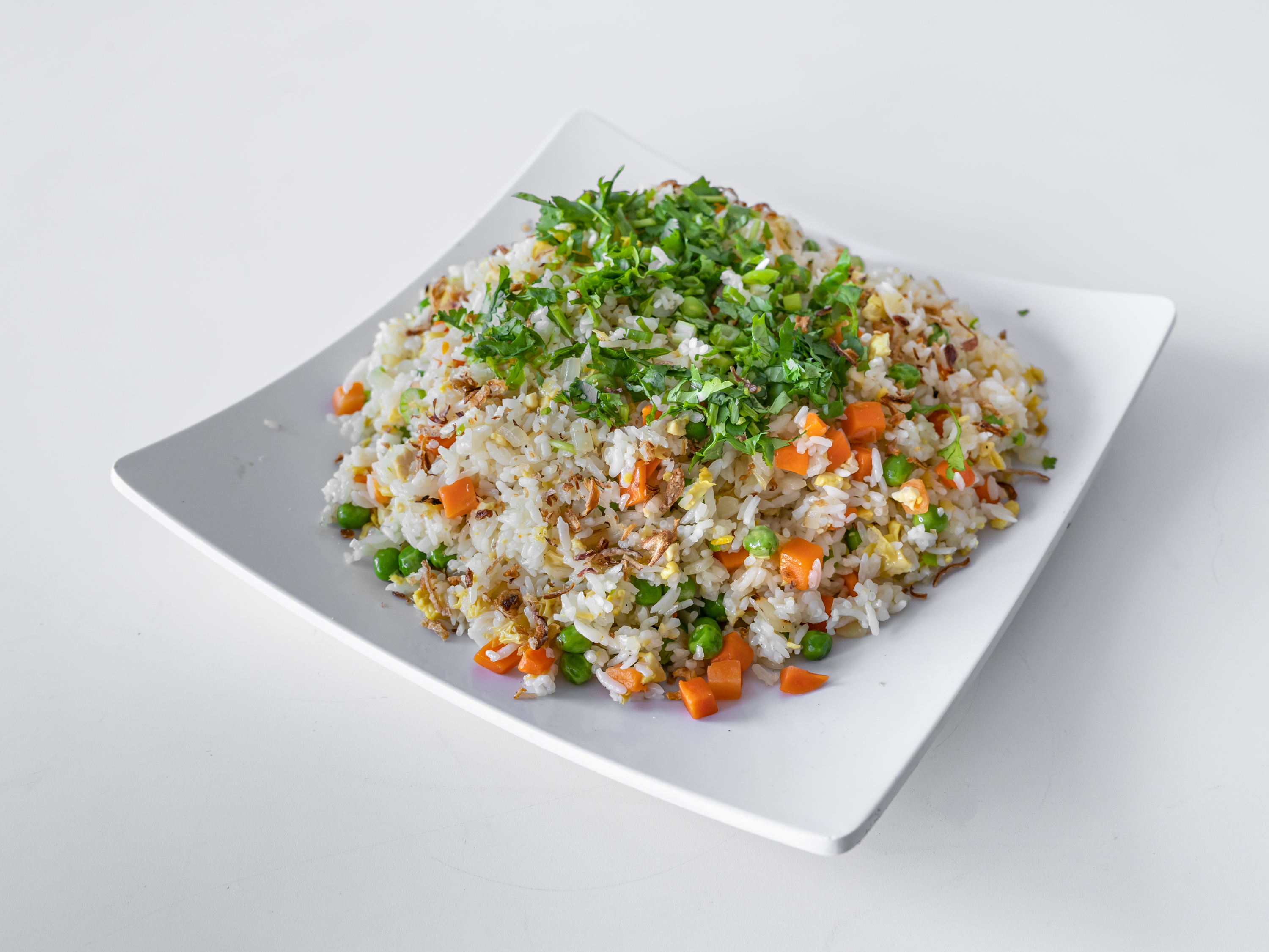 Order 17. Healthy Fried Rice Dish food online from Loving Hut Vegan Express store, San Diego on bringmethat.com