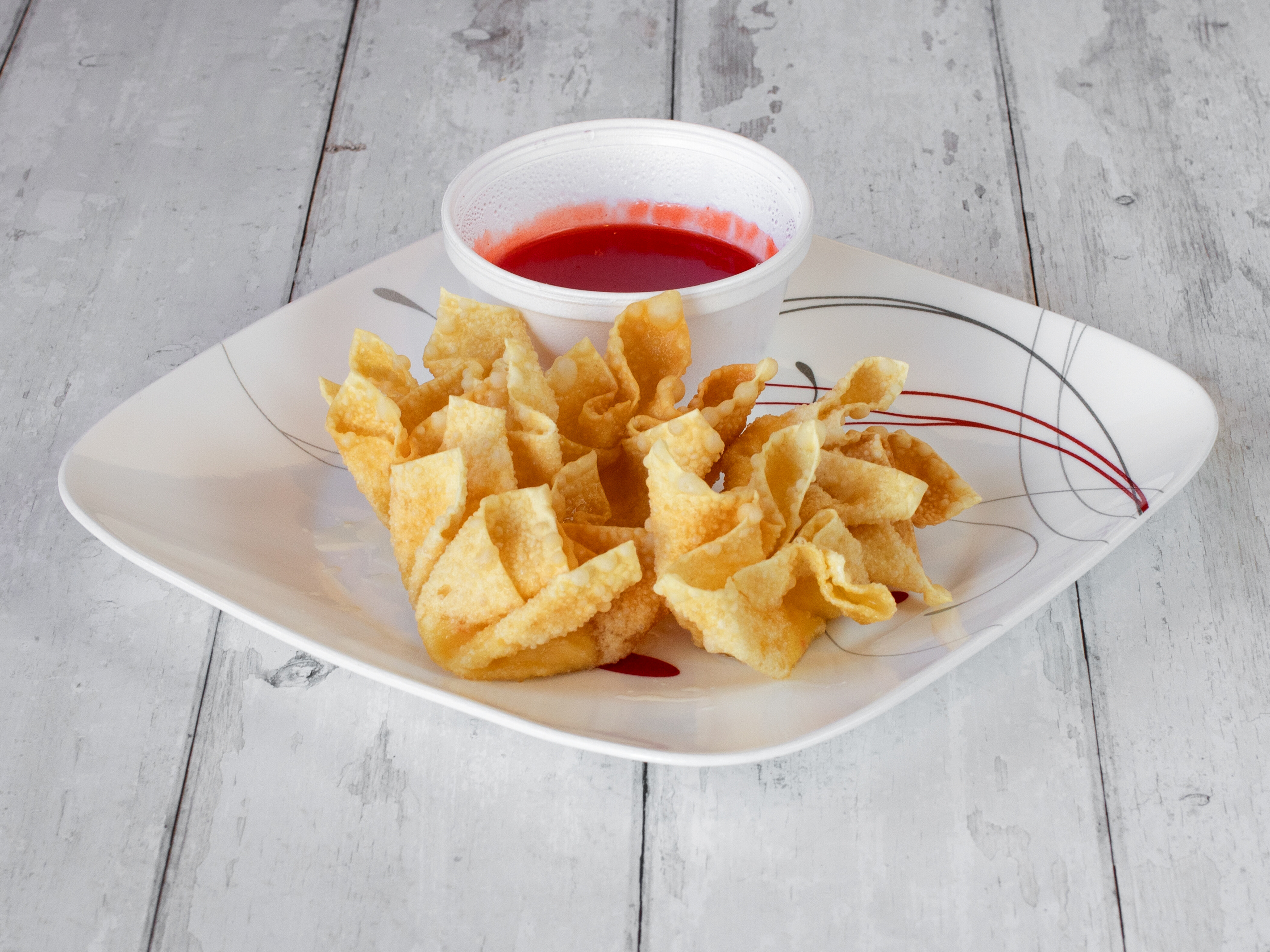 Order 11. Crab Meat Rangoon food online from Great Dragon Express store, Dubuque on bringmethat.com