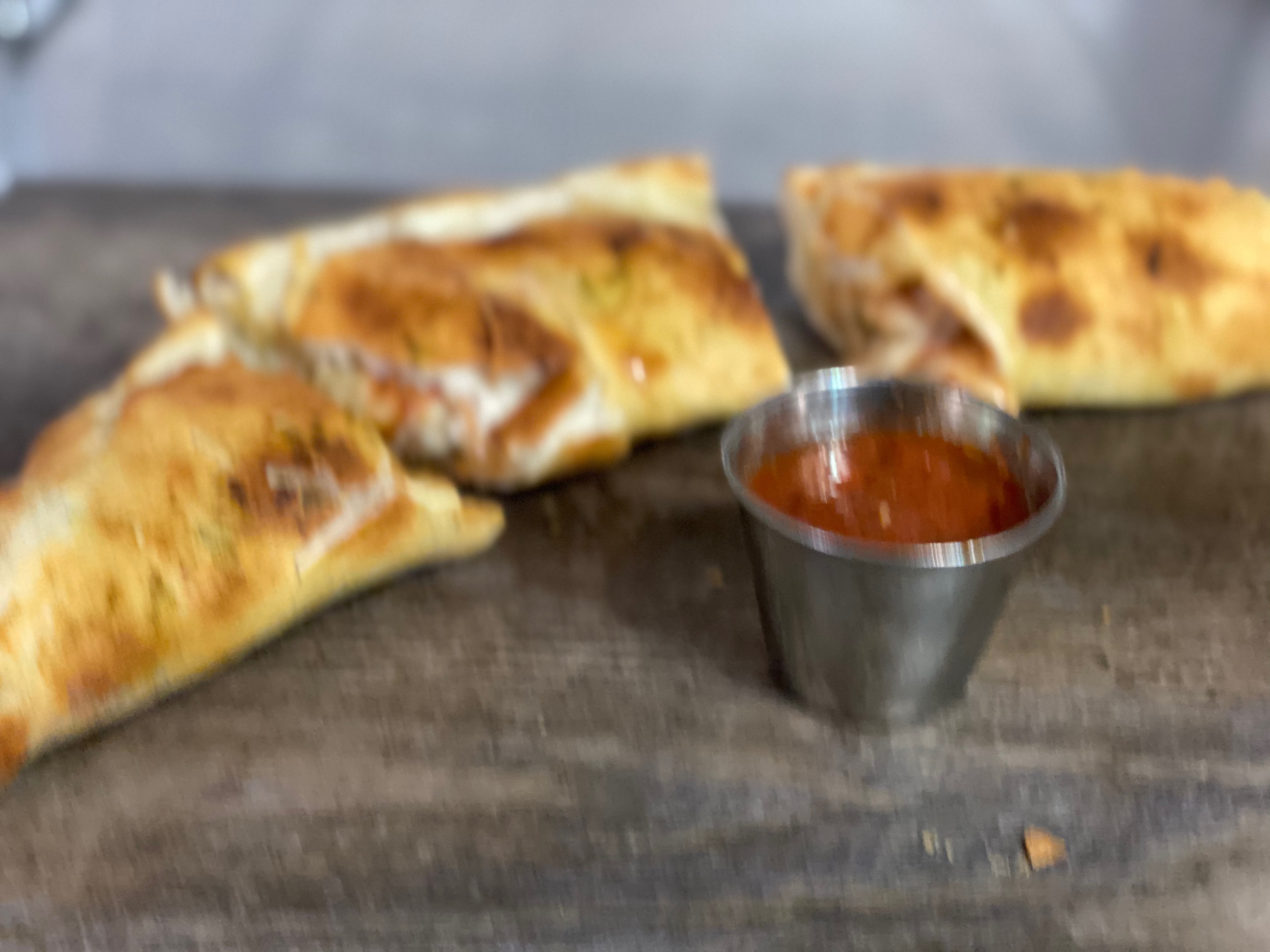 Order Calzone food online from Midtown Pizza store, Dallas on bringmethat.com