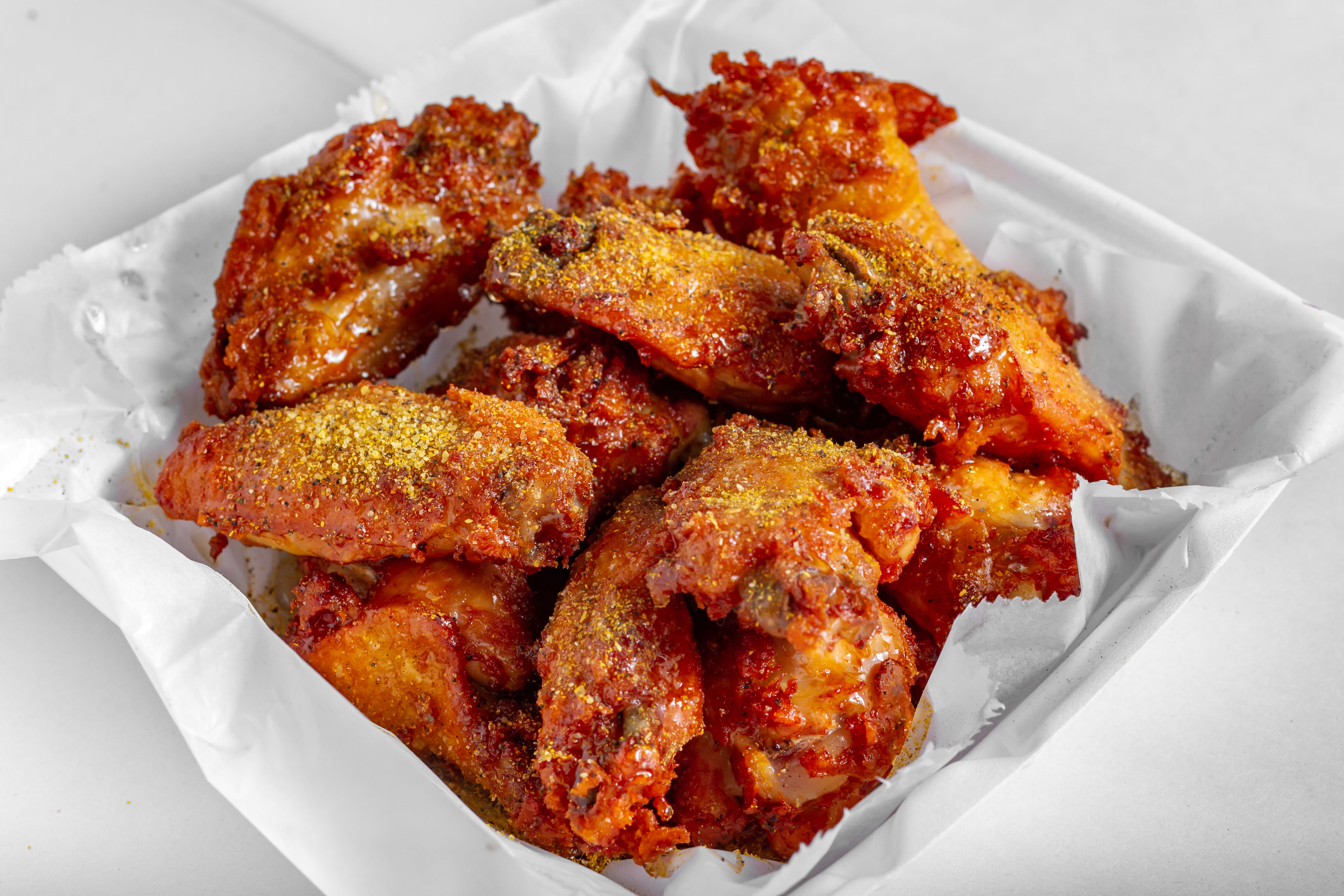 Order Regular Traditional Wings - 6 Pieces food online from Wings Things N More store, Catonsville on bringmethat.com