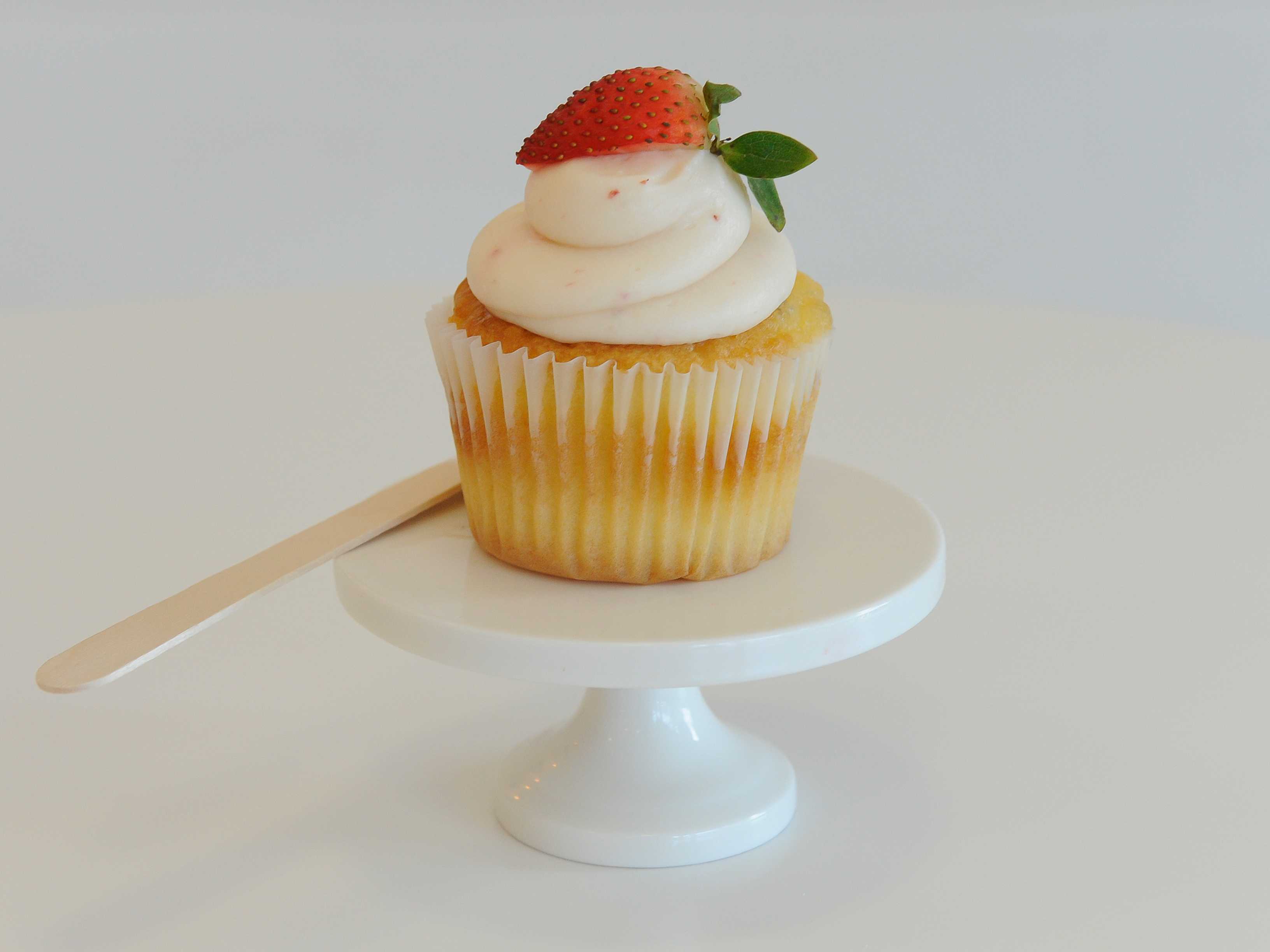 Order Strawberries -N- Cream Cupcake food online from Camicakes Creamery store, Smyrna on bringmethat.com