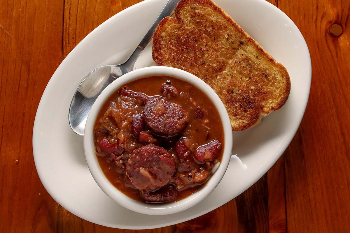 Order Red Beans & Rice - Cup food online from Boudreaux's Cajun Kitchen store, Houston on bringmethat.com