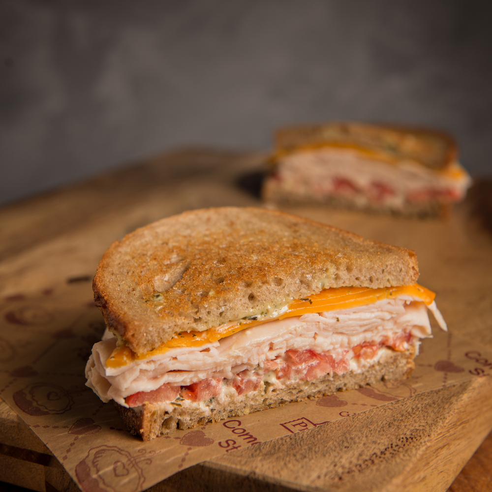 Order Lighthouse Turkey Cheddar Sandwich food online from Grand Traverse Pie Company store, East Lansing on bringmethat.com