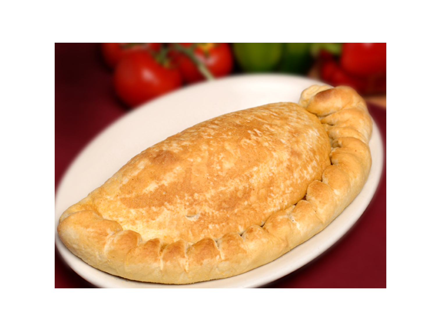 Order Traditional Calzone food online from Macianos Pizza & Pastaria store, Vernon Hills on bringmethat.com