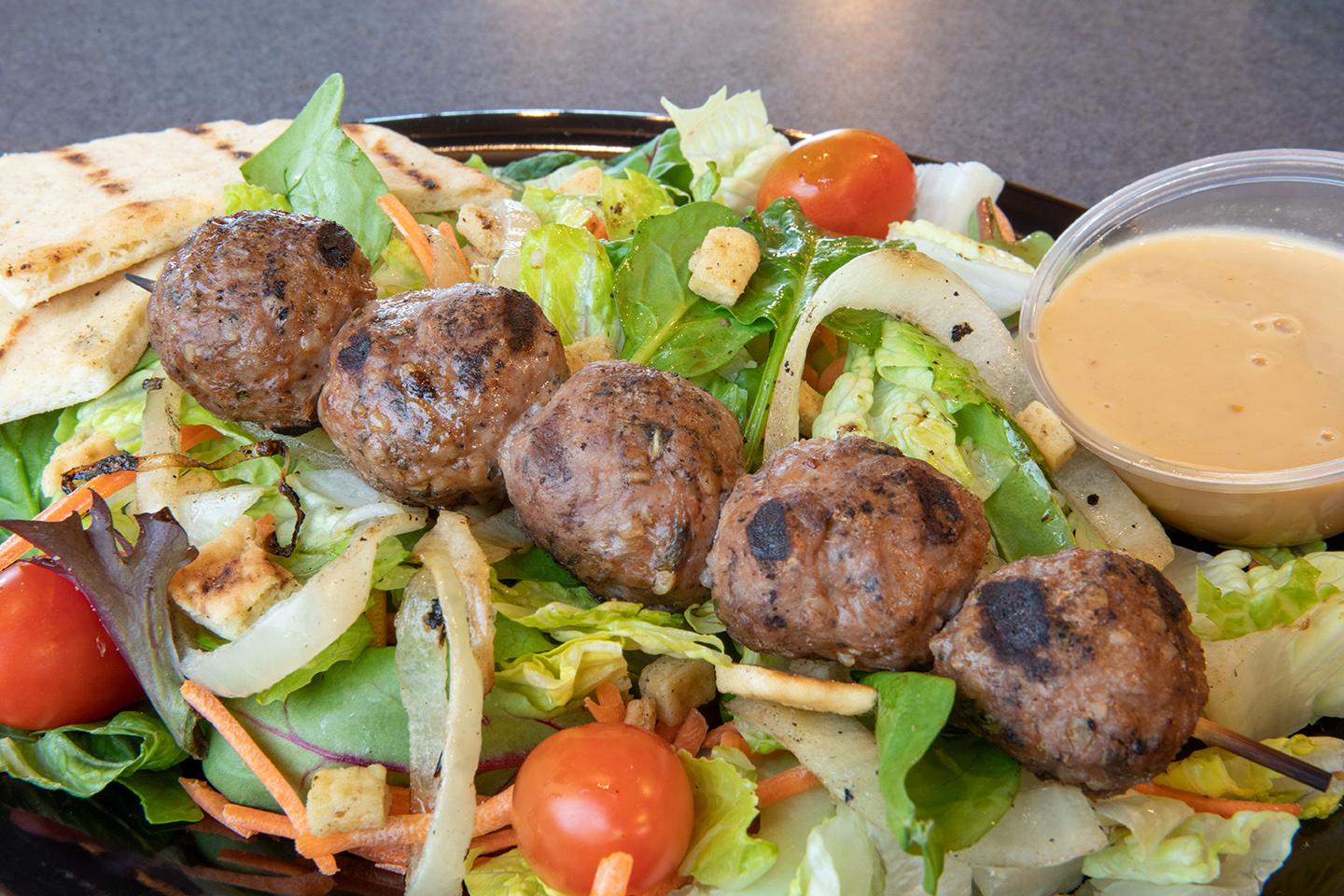 Order Salad - Kibbeh food online from Sticks Kebob Shop store, Charlottesville on bringmethat.com