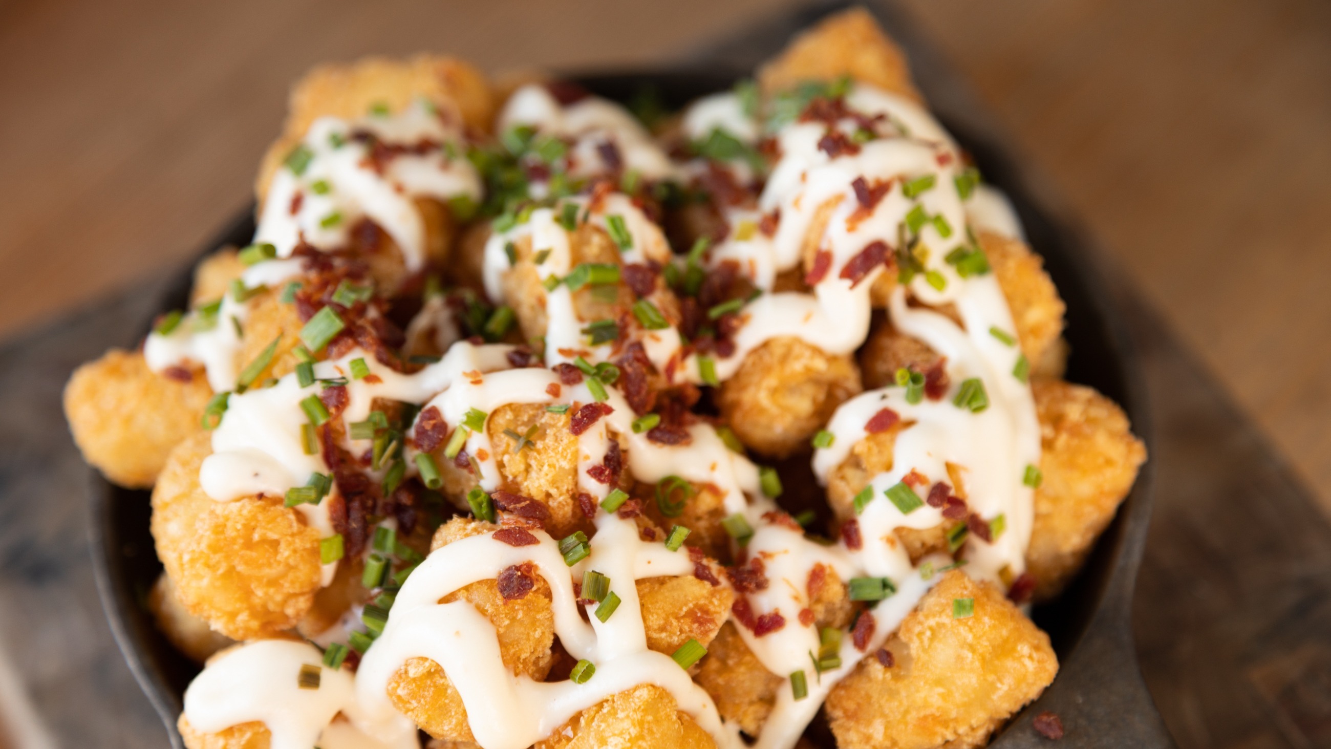Order Loaded Tots food online from Stout Burger store, Palm Springs on bringmethat.com