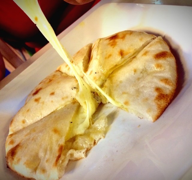 Order Cheese Naan food online from India's Grill store, Los Angeles on bringmethat.com