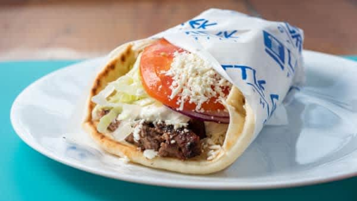 Order PITA BURGER food online from Little Greek Fresh Grill store, Youngstown on bringmethat.com
