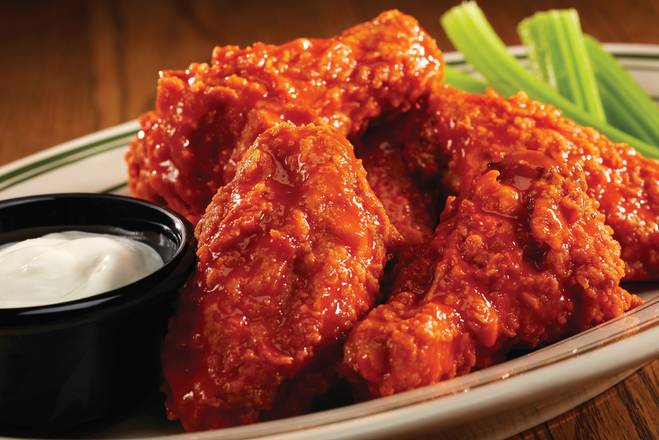 Order Bennigan's Premium Buffalo Wings food online from Bennigan On The Fly store, Coralville on bringmethat.com