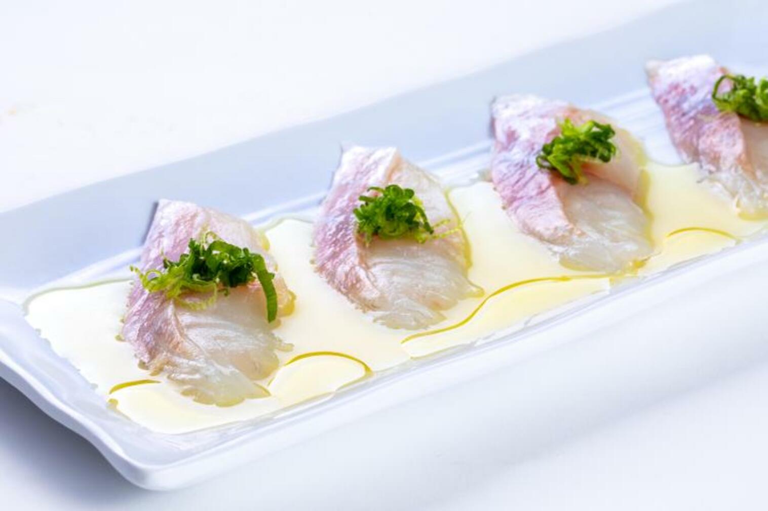 Order (g055) Snapper Yuzu Sauce Sashimi food online from Sushi Stop store, Los Angeles on bringmethat.com