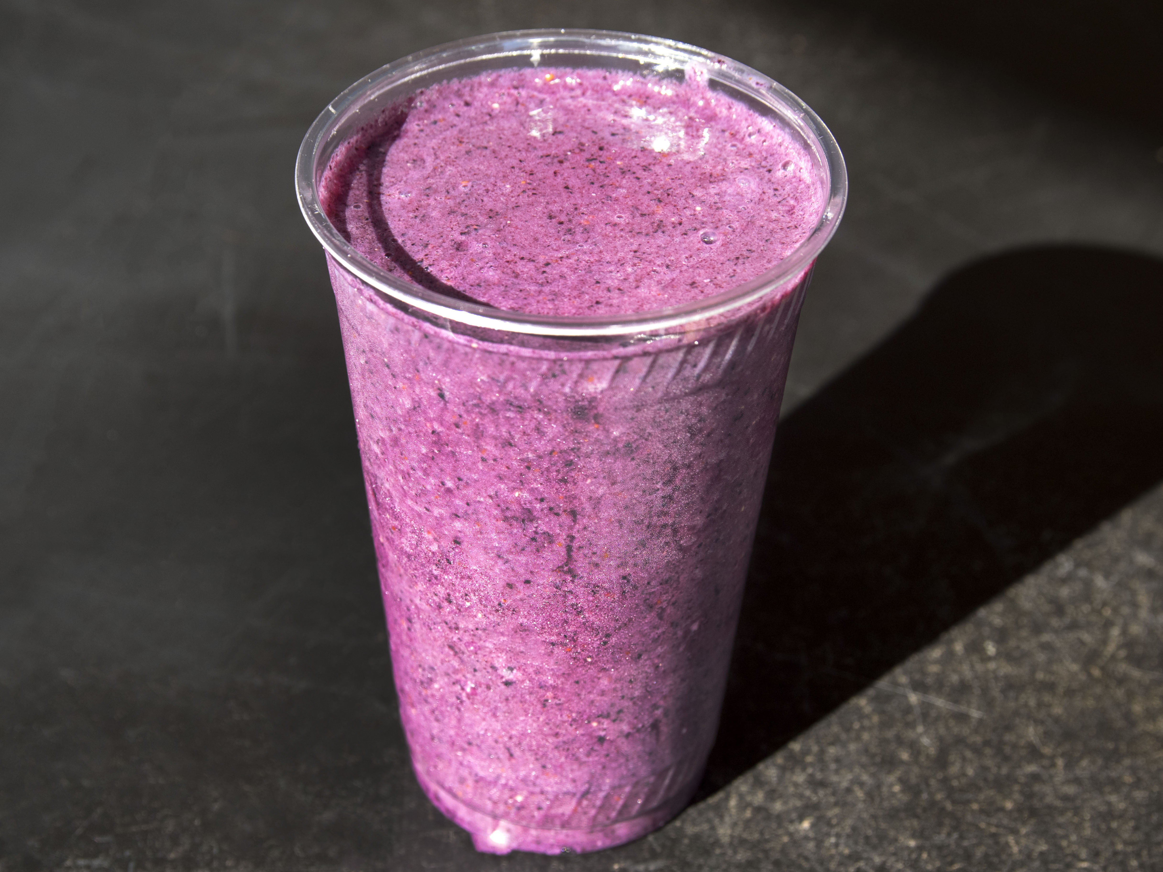Order 20 oz. Blueberry Bomb Smoothie food online from Cafe By The Bay store, San Diego on bringmethat.com