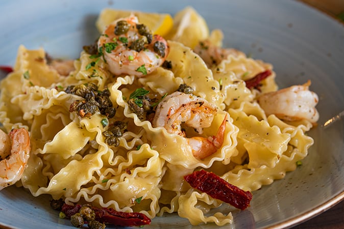 Order Shrimp Scampi food online from Russo's Pizza store, Galveston on bringmethat.com