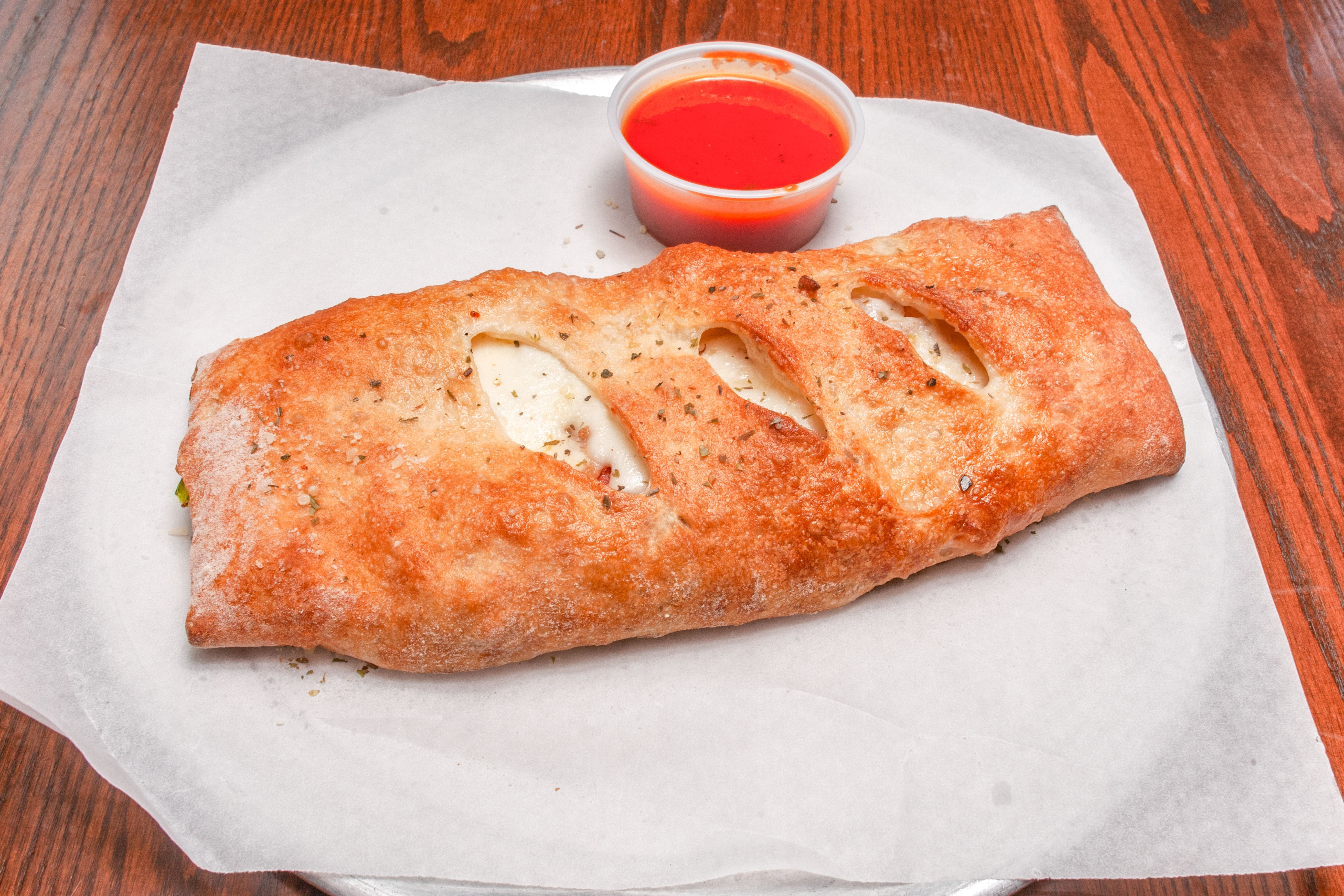 Order Build Your Own Stromboli - Stromboli food online from Primo Pizza Ny Style store, Cary on bringmethat.com