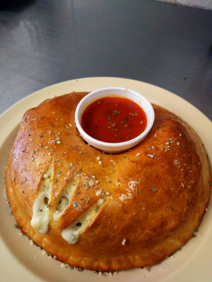 Order Create Your Own Calzone food online from Massino Pizzeria store, Arvada on bringmethat.com