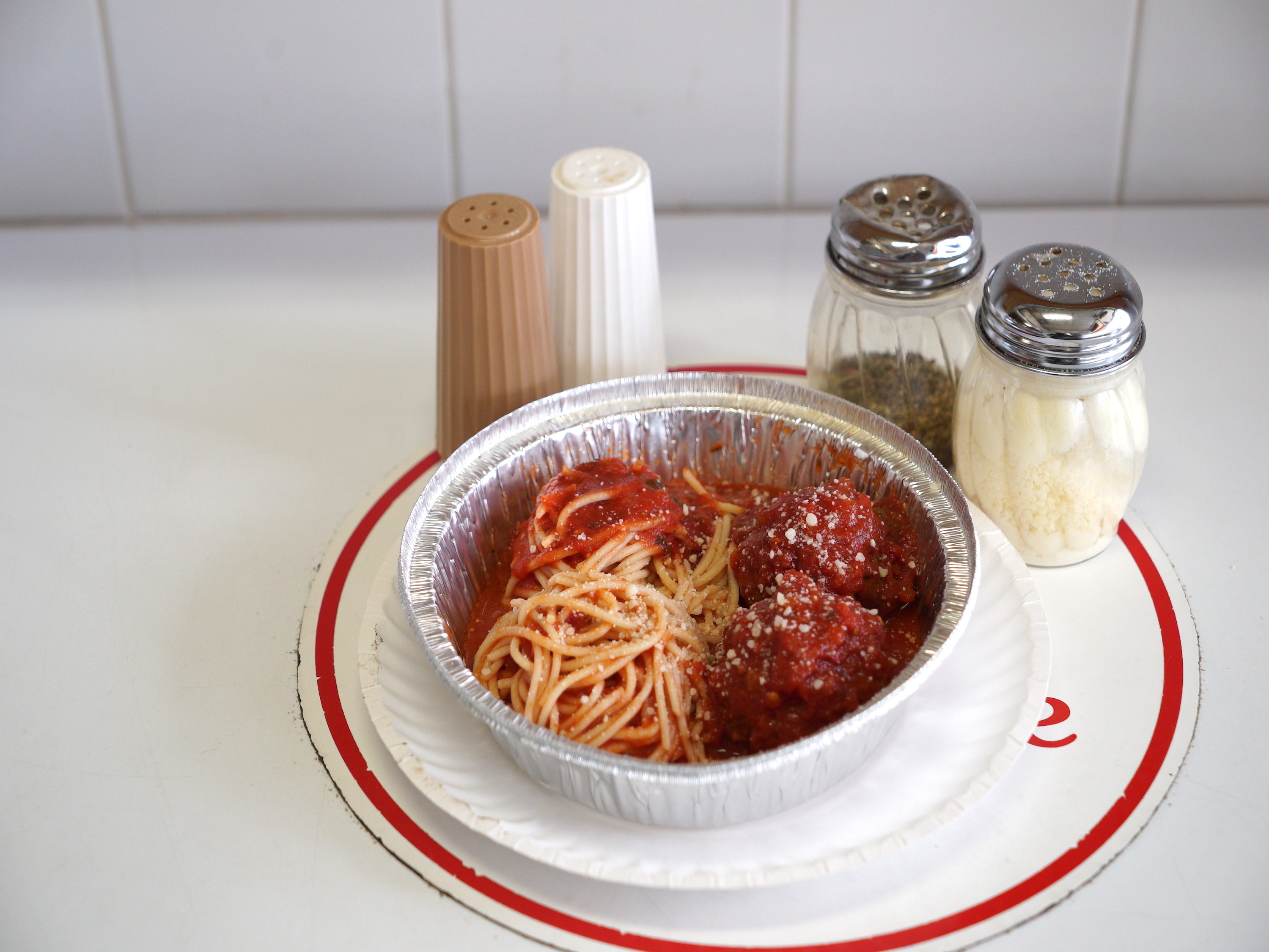 Order 9” Meatball with Pasta Dinner food online from Papi's Ny Pizza store, Fort Lauderdale on bringmethat.com