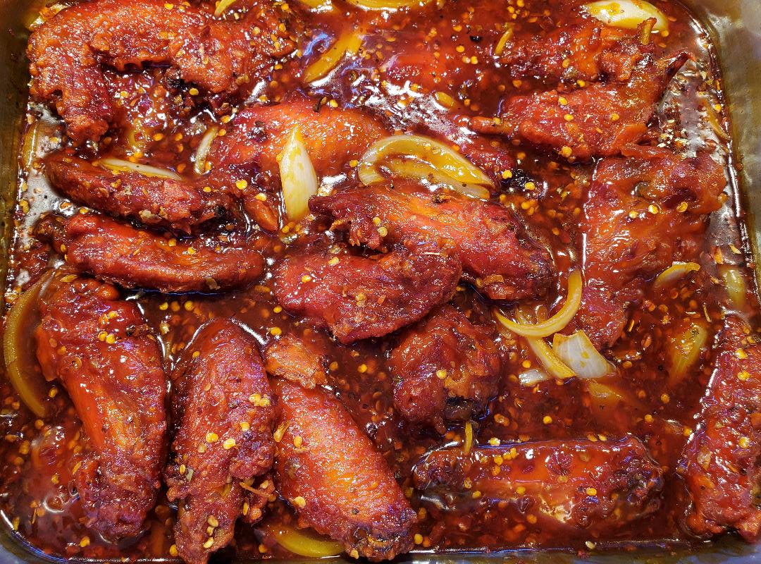 Order Hot Chicken Wings (medium Tray  10 to 15 people) food online from Chinatown Express store, Los Angeles on bringmethat.com