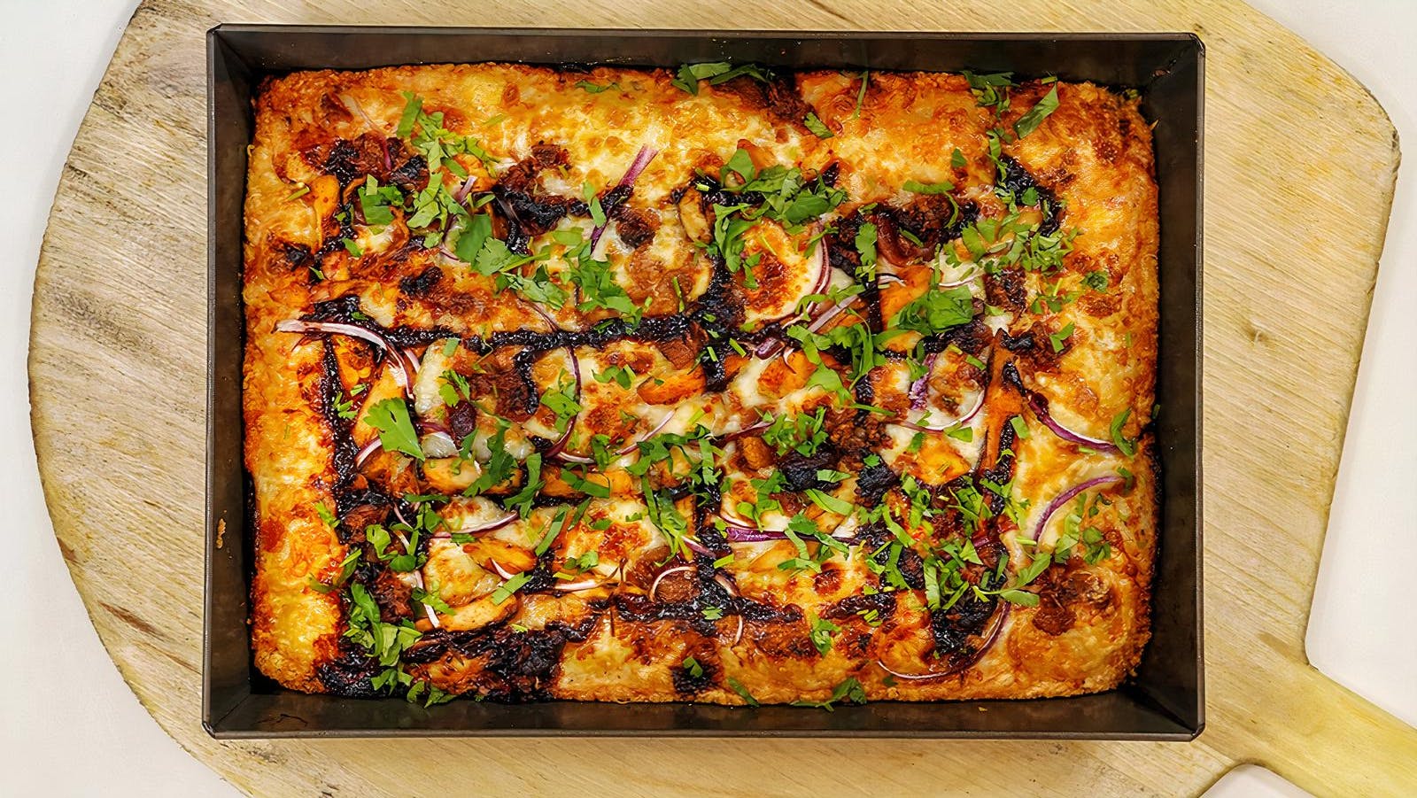 Order BBQ Chicken Sicilian Style Pizza - 10''x14'' food online from Breakfast Pizza store, San Francisco on bringmethat.com