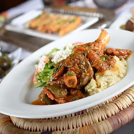 Order Baked Lamb Shank food online from Pom & Olive store, Costa Mesa on bringmethat.com