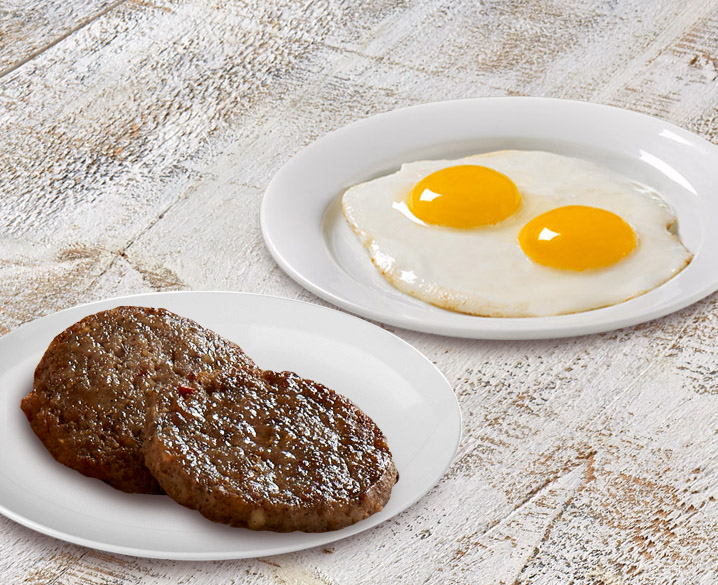 Order 2 Eggs & Country Sausage food online from Huddle House store, Austin on bringmethat.com