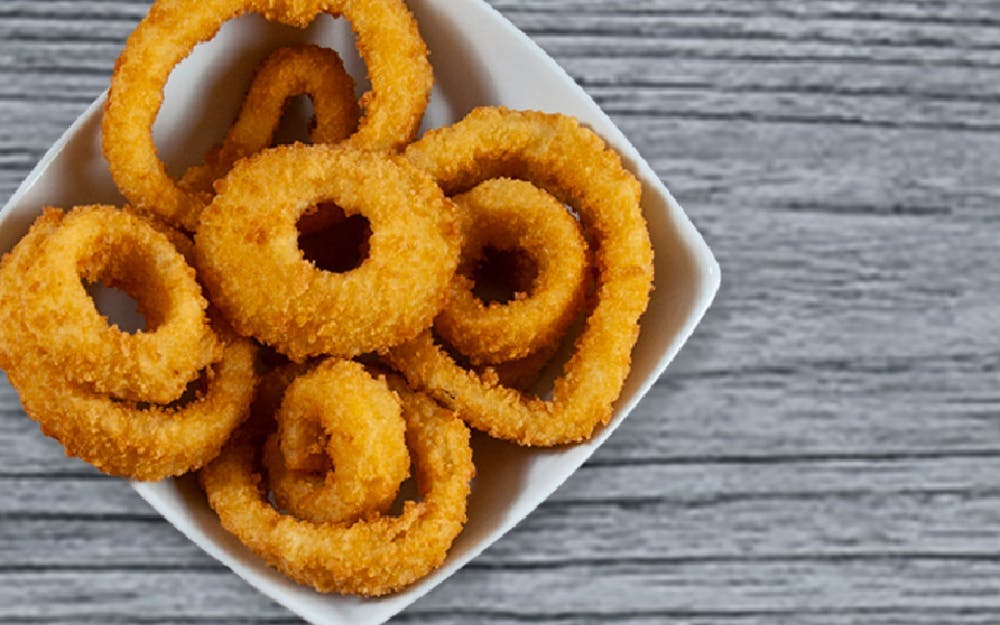 Order Onion Rings - Side food online from Seasons Pizza store, Wilmington on bringmethat.com