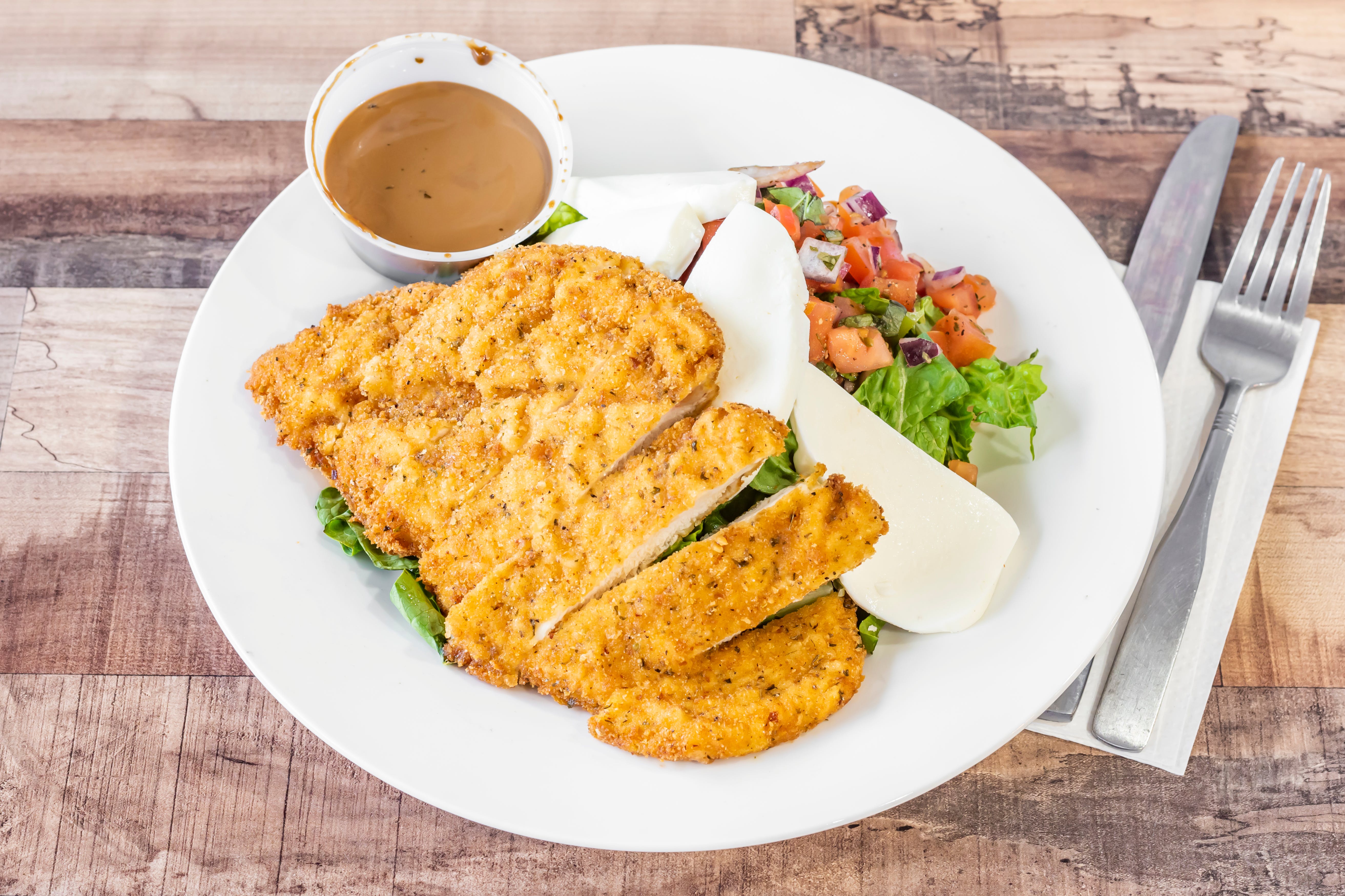 Order Chicken Milanese Salad - Salad food online from Pasquales Pizzeria store, Wall Township on bringmethat.com