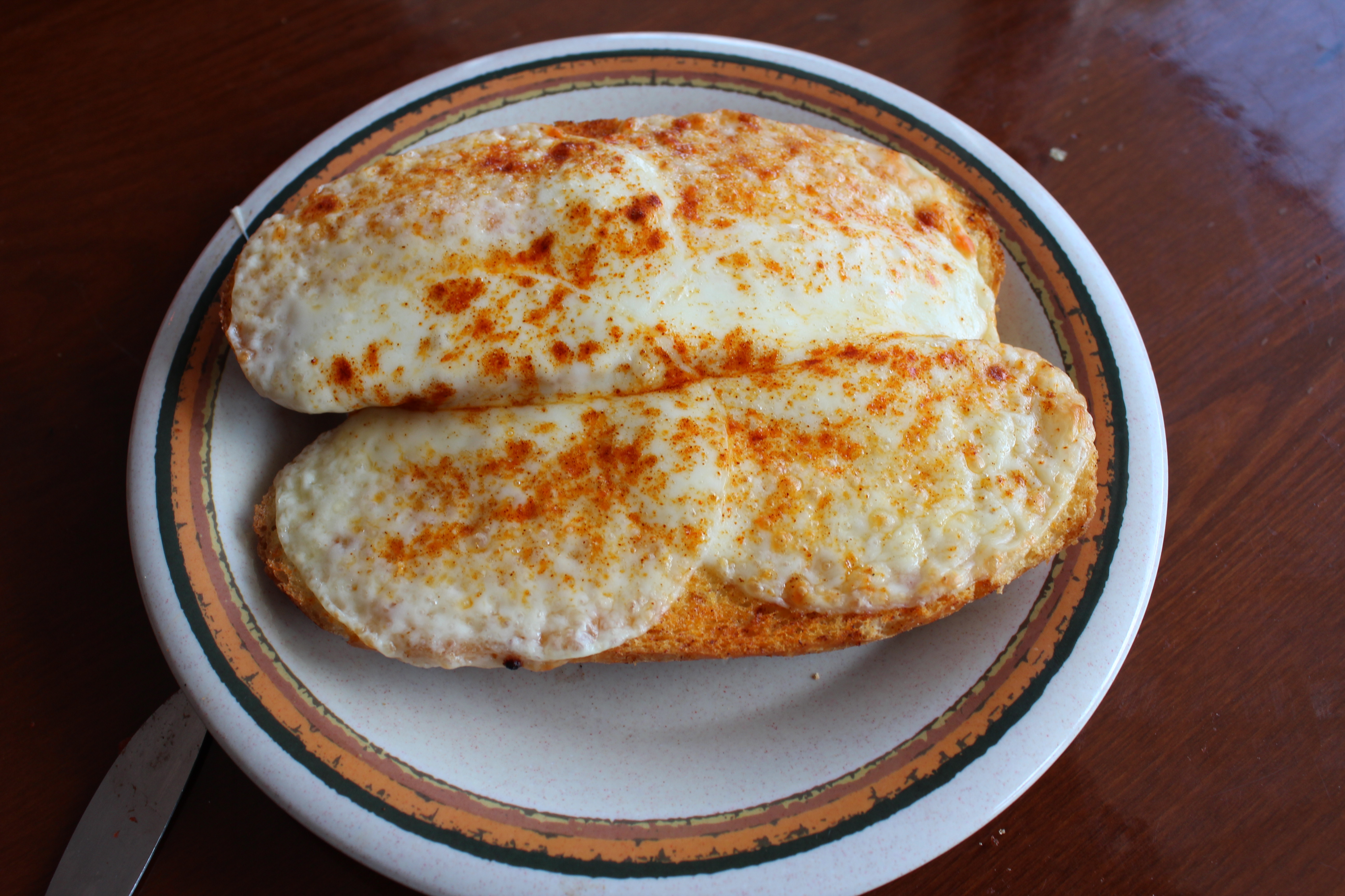 Order Cheesy Garlic Toast food online from Quatro's store, Carbondale on bringmethat.com