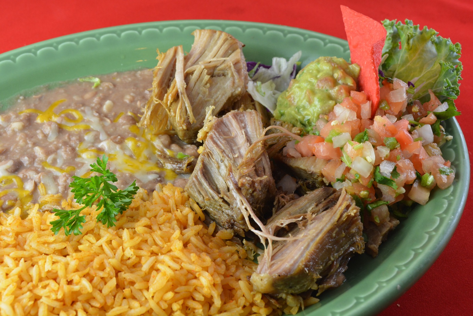 Order Carnitas de la Casa food online from Jalapenos Mexican Restaurant Eagle River store, Eagle River on bringmethat.com