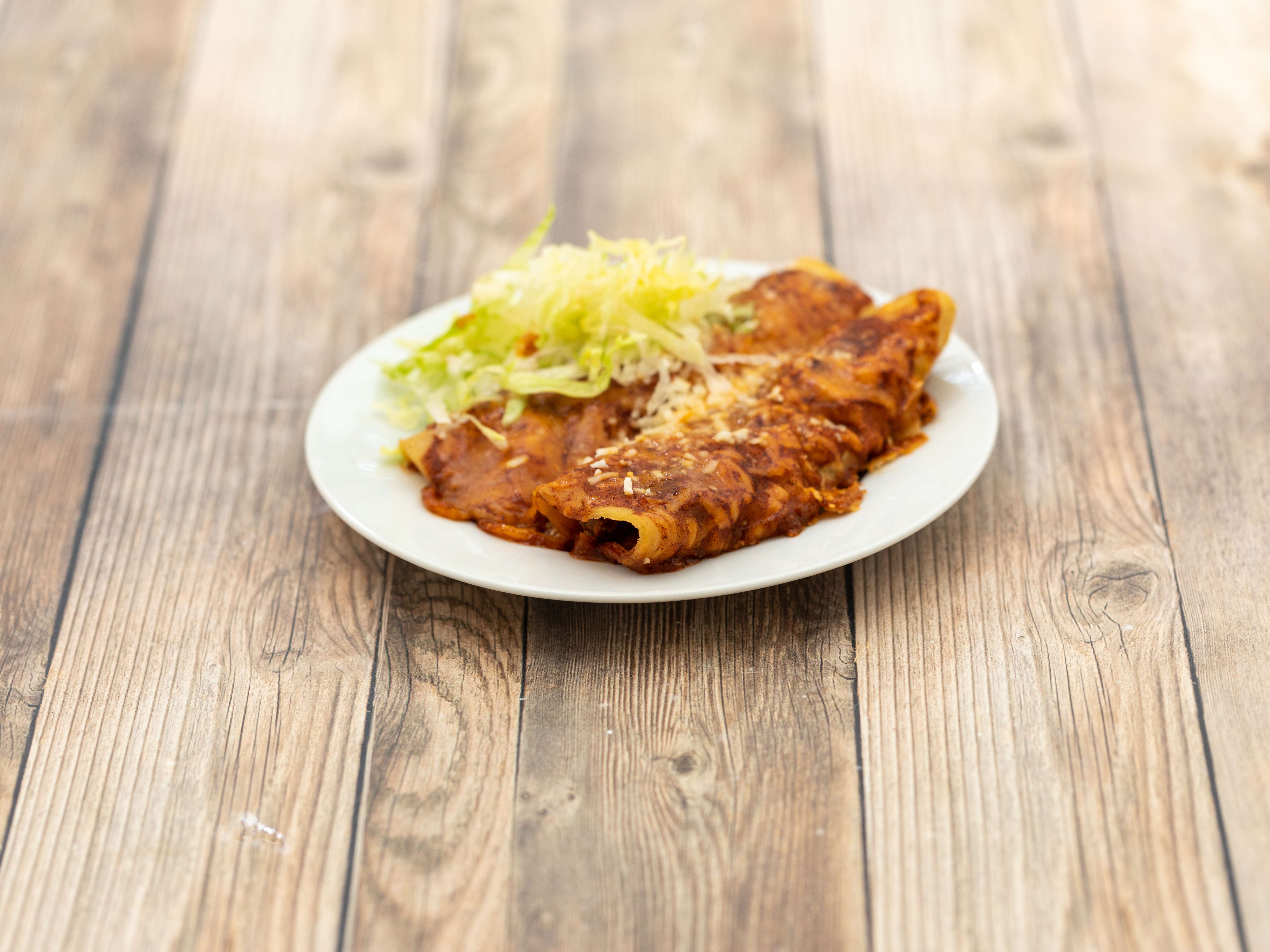 Order Beef Enchilada food online from Penelopes Mexican Food store, San Diego on bringmethat.com