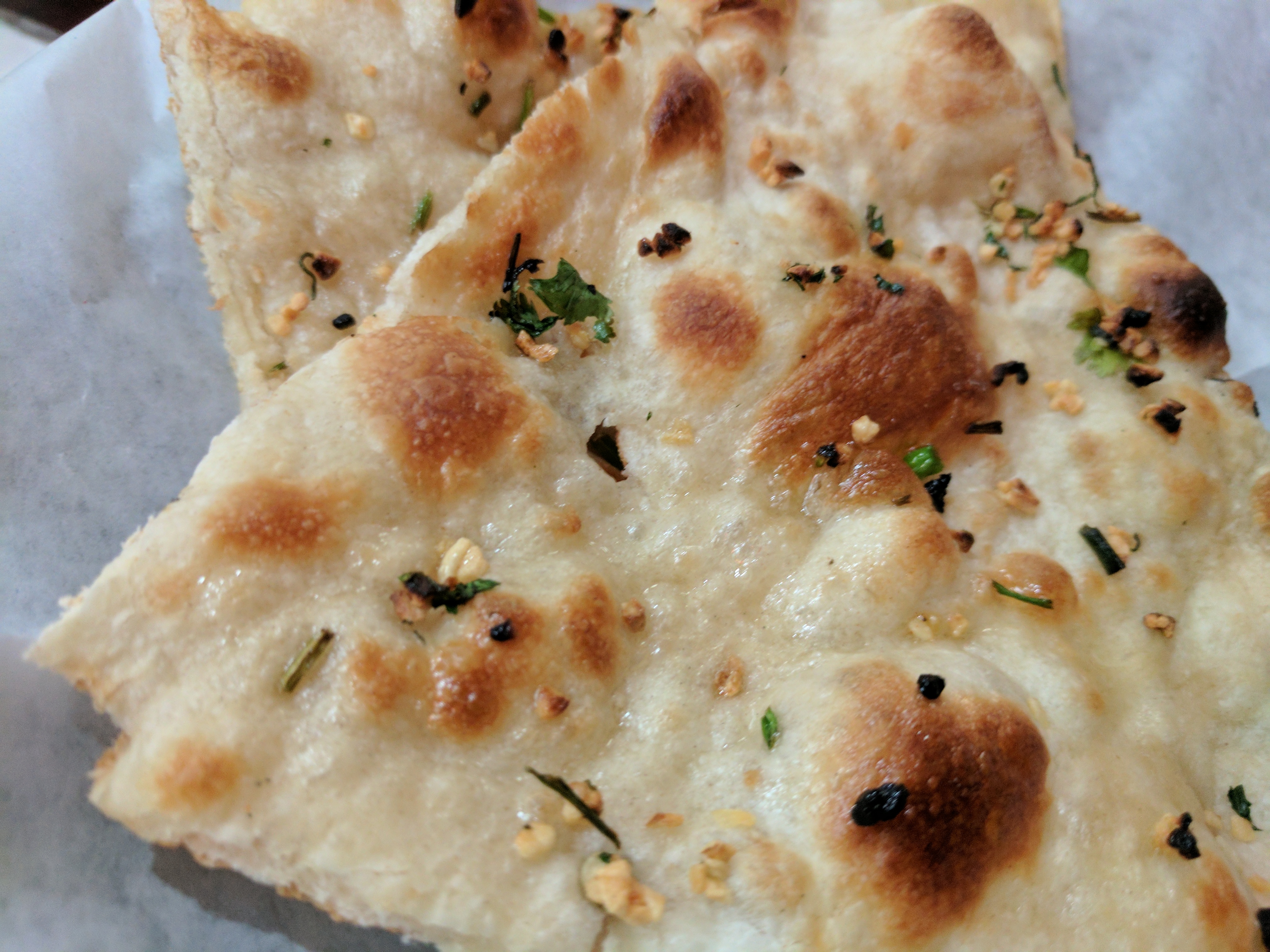 Order Garlic Naan food online from Himalayan Nepali Cuisine store, Cary on bringmethat.com