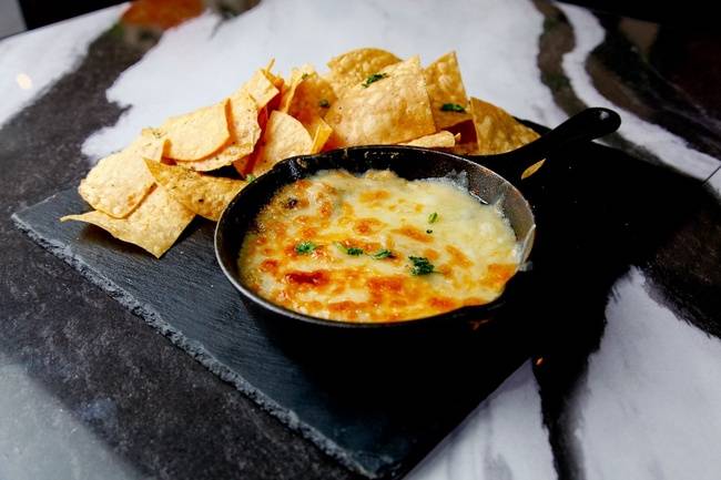 Order Spinach Queso Dip food online from Blaqhaus Atl store, Marietta on bringmethat.com